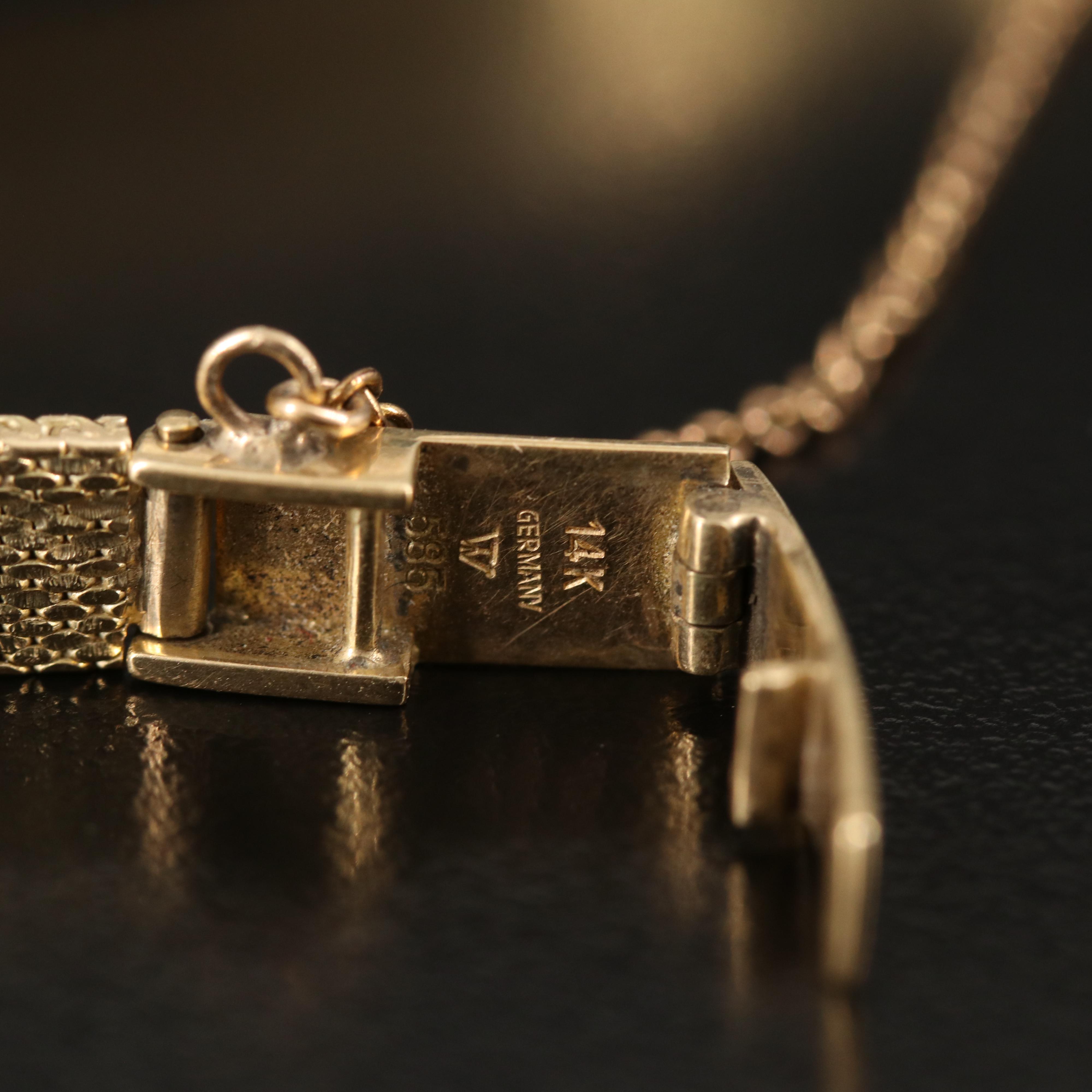 14K Universal Geneve Stem Wind Watch