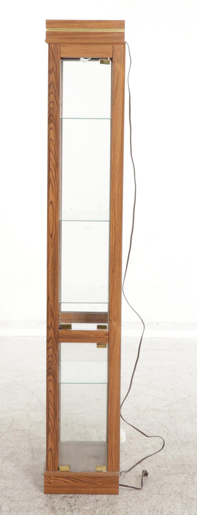 Ashley Furniture Oak-Grained Illuminated Curio Cabinet