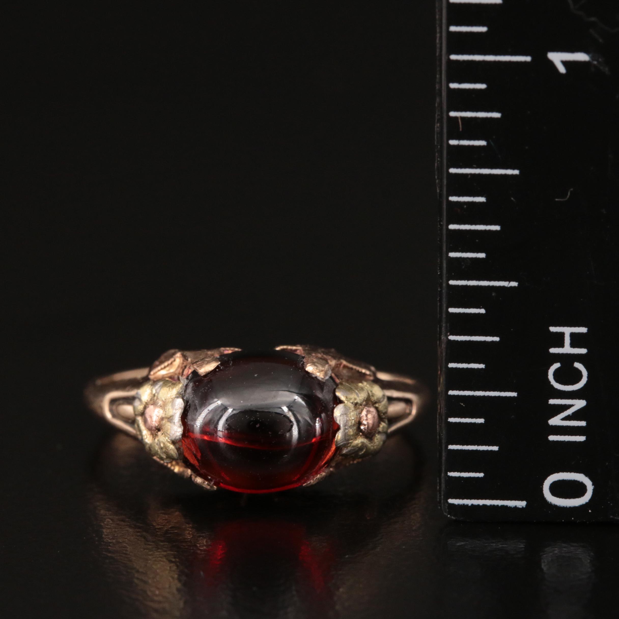 1930s 10K Garnet Ring with Green and Rose Gold Flower Accents