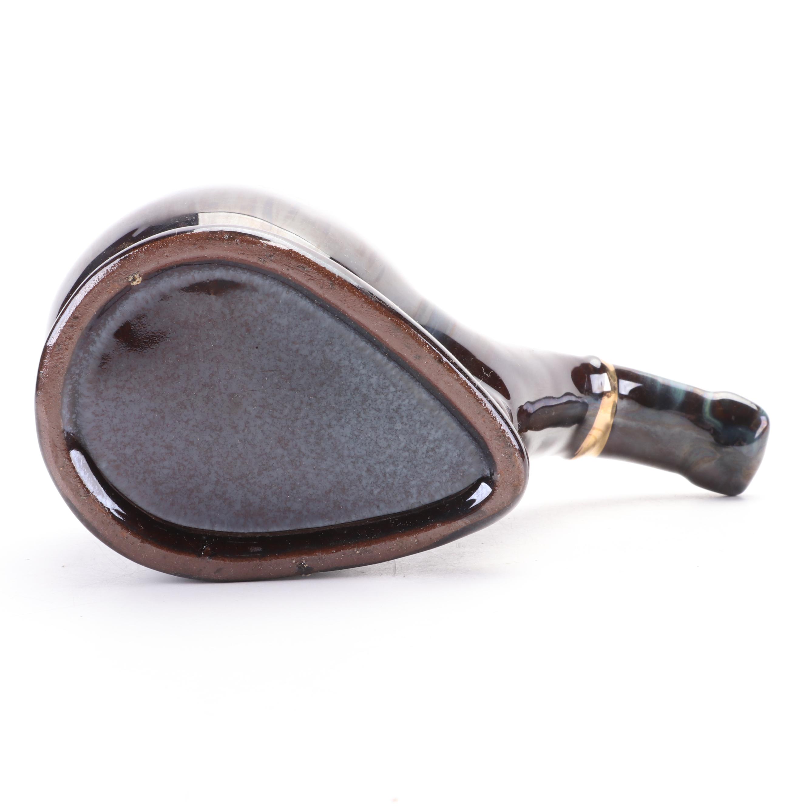 McMaster with Other Ashtrays, Musical Cigarette Box and Shoe Figurine