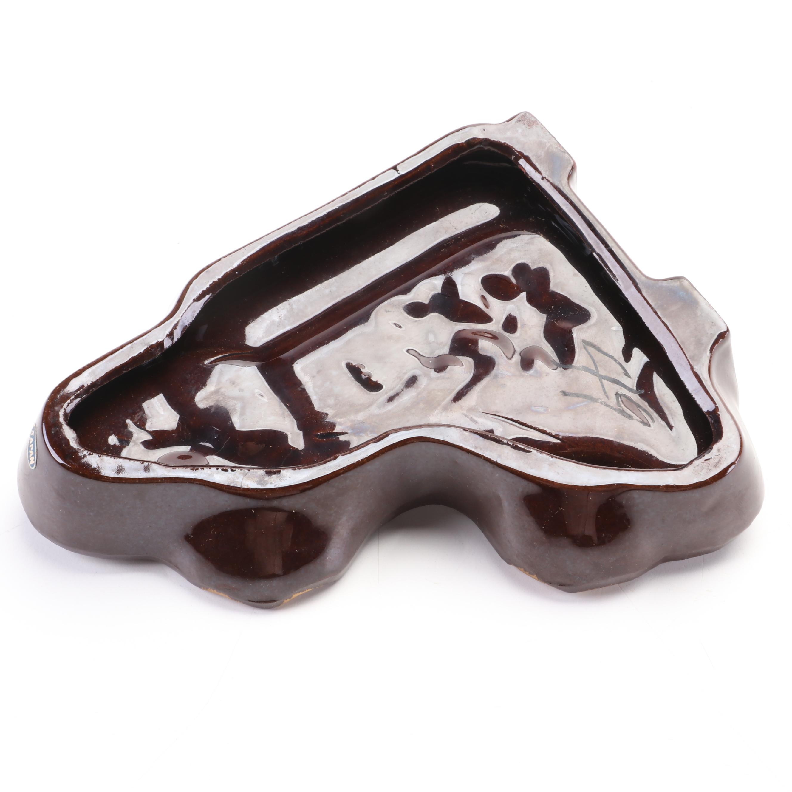 McMaster with Other Ashtrays, Musical Cigarette Box and Shoe Figurine