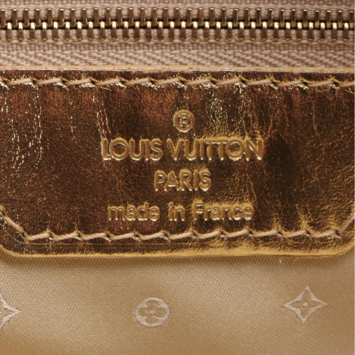 Louis Vuitton Lockit Bag in Gold Metallic Suhali Leather