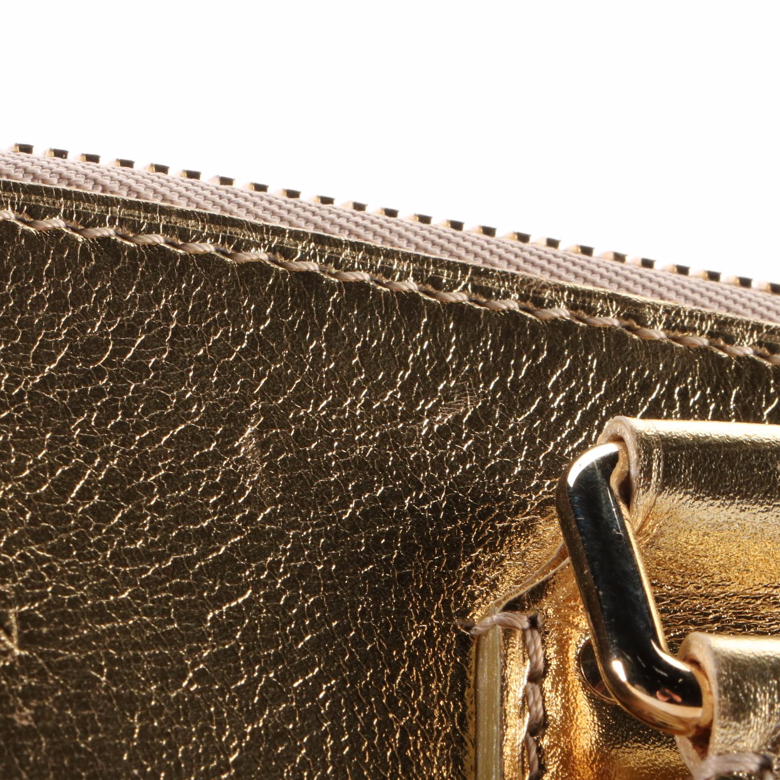 Louis Vuitton Lockit Bag in Gold Metallic Suhali Leather