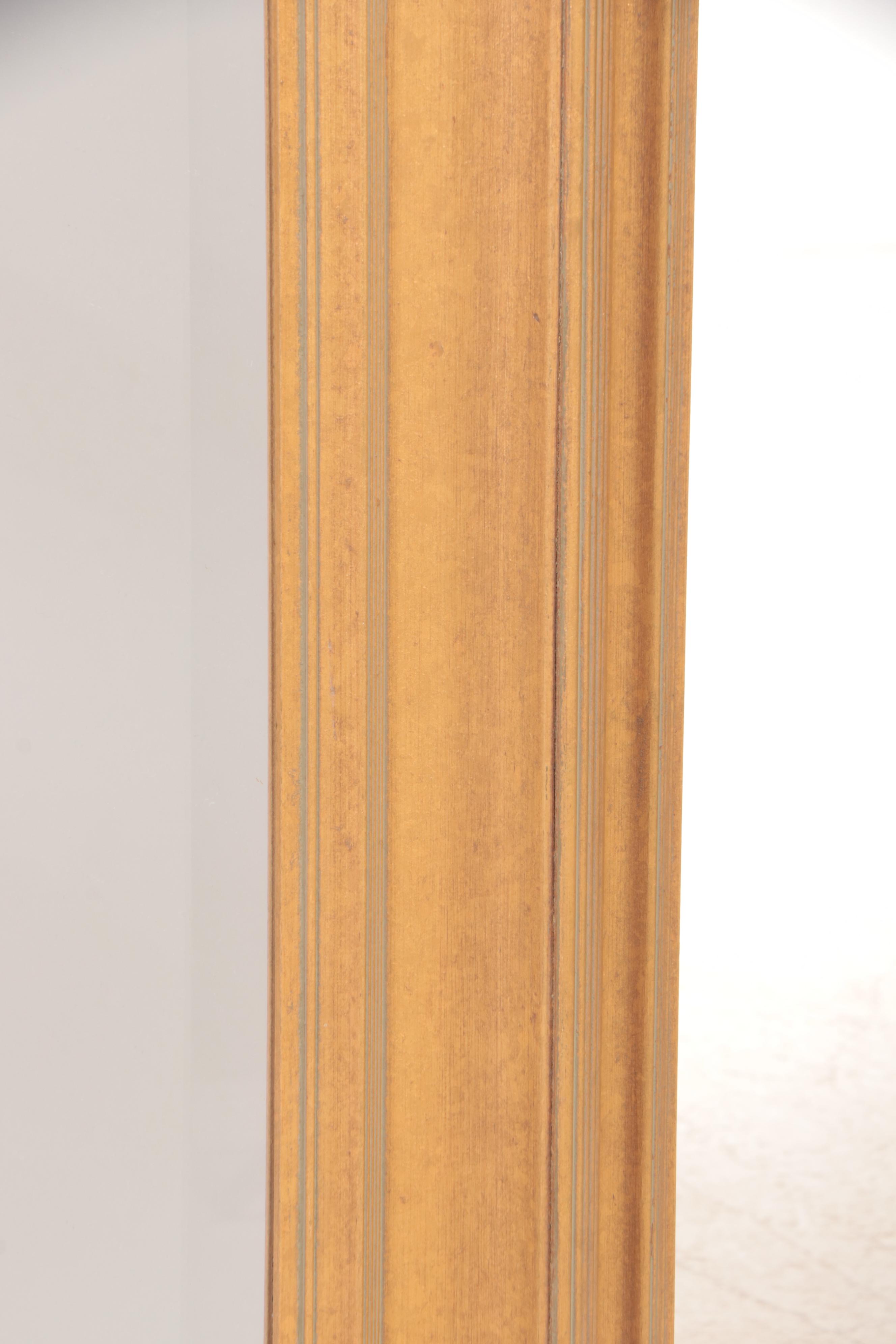 The Uttermost Company Giltwood and Beveled Glass Mirror