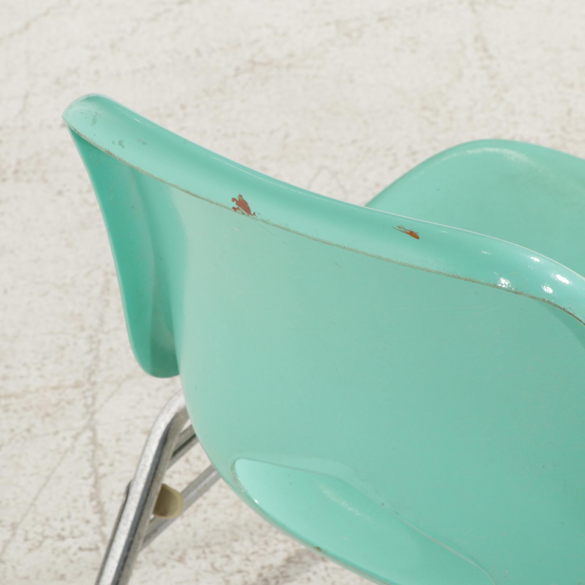 Four Krueger Metal Products Stackable Molded Fiberglass Shell Chairs