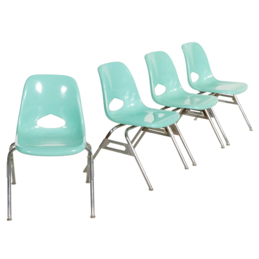 Four Krueger Metal Products Stackable Molded Fiberglass Shell Chairs