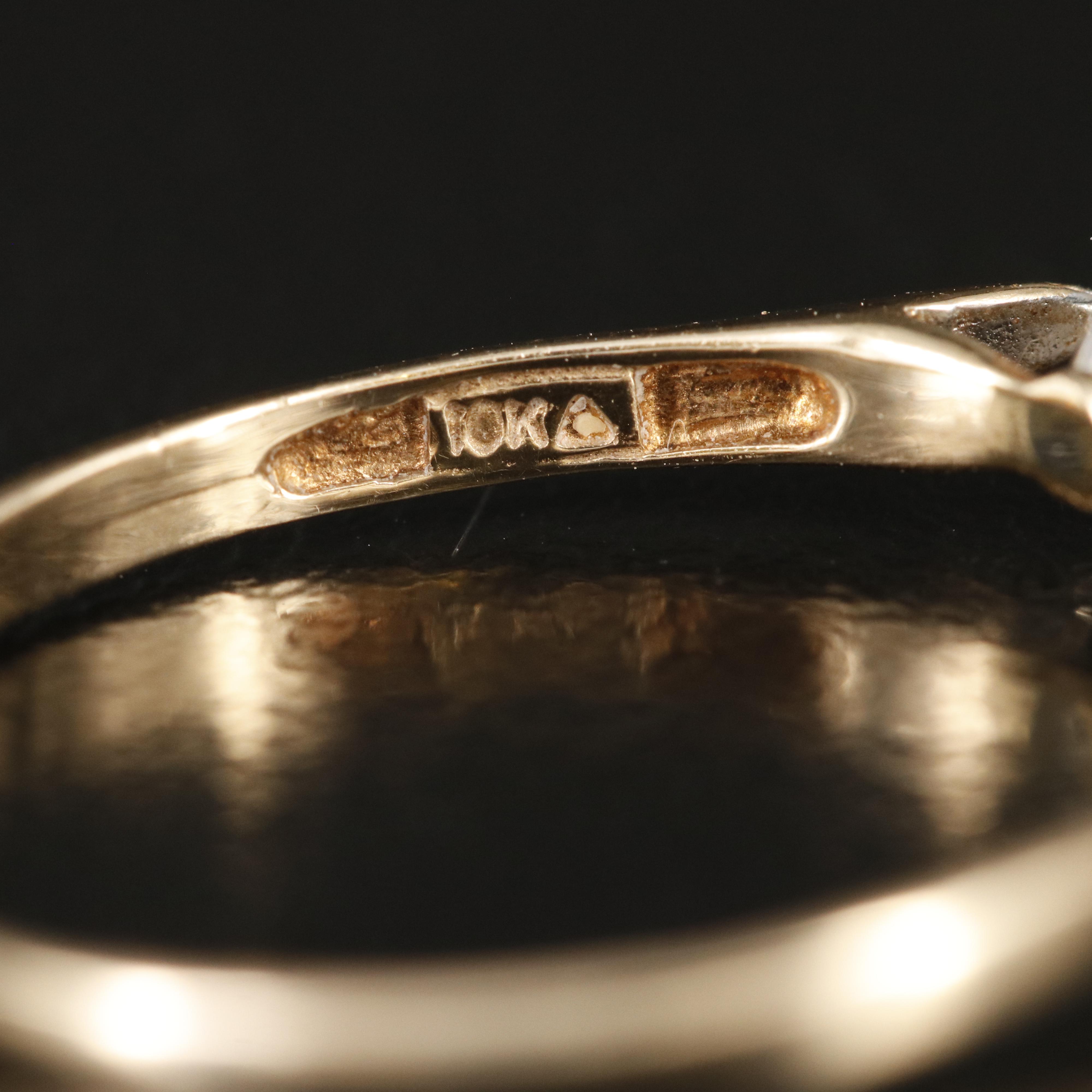 10K 0.18 CT Diamond Solitaire Ring