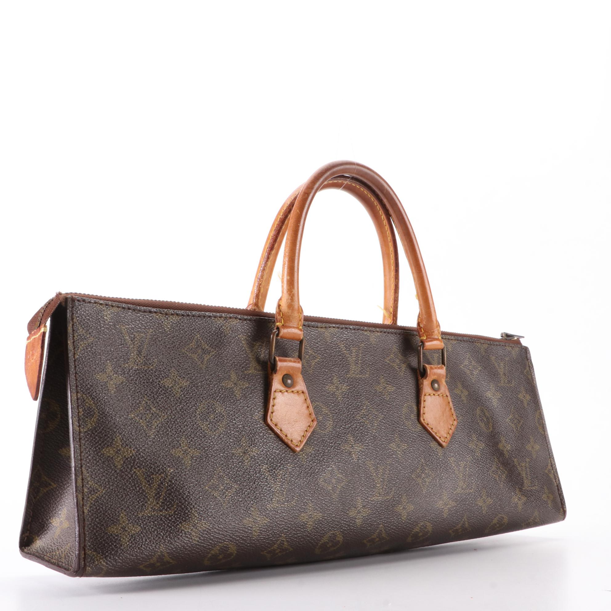 Louis Vuitton Sac Triangle in Monogram Canvas and Vachetta Leather