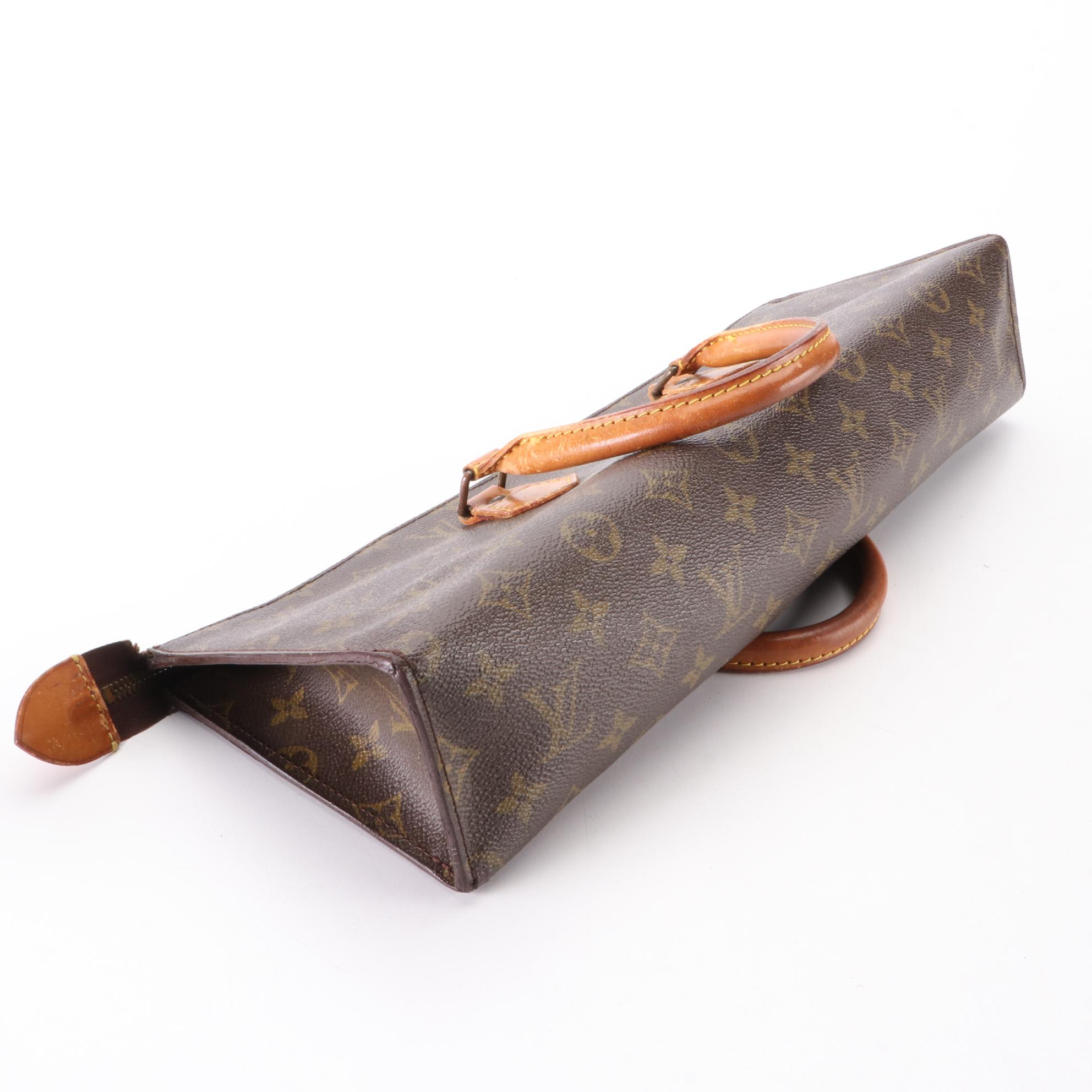 Louis Vuitton Sac Triangle in Monogram Canvas and Vachetta Leather