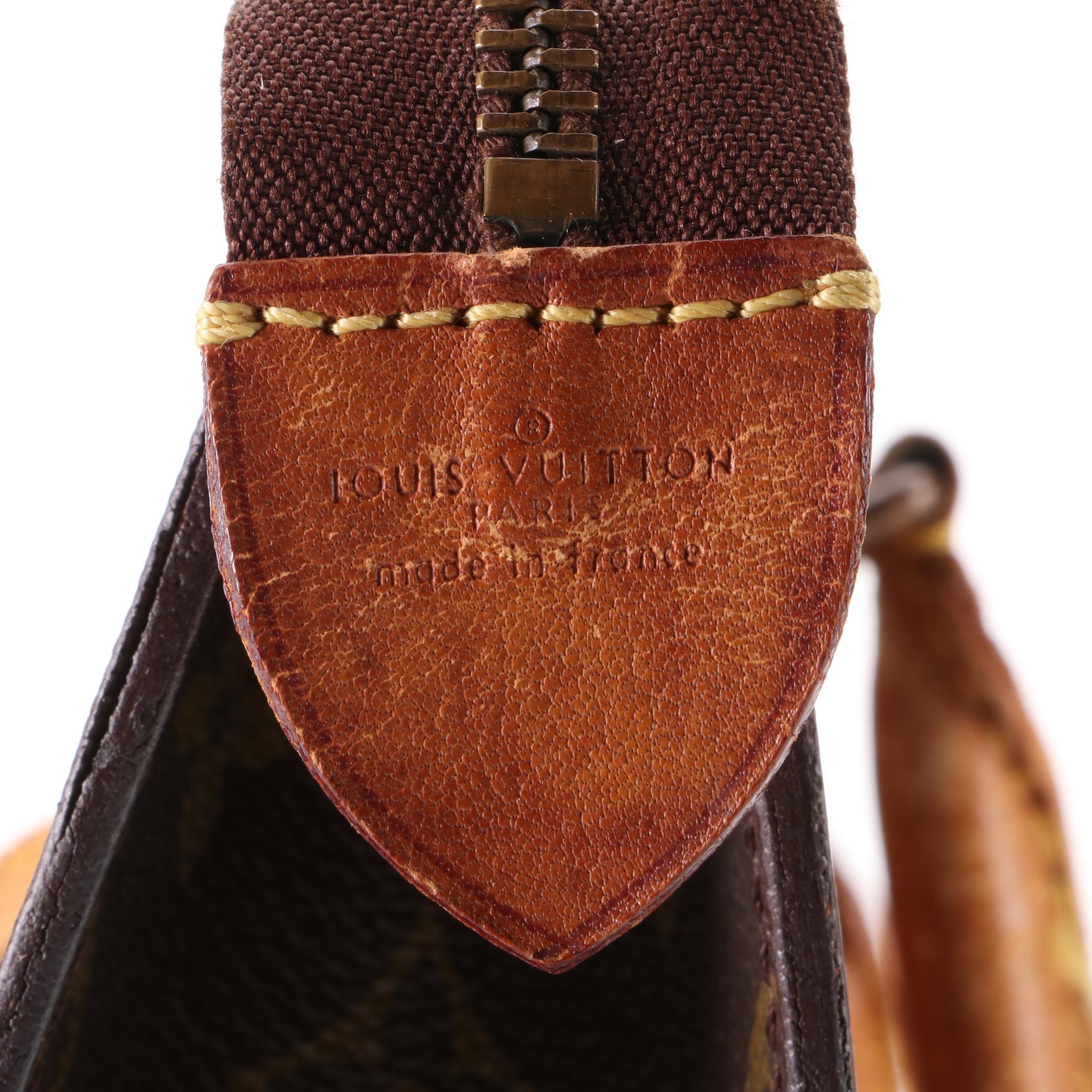 Louis Vuitton Sac Triangle in Monogram Canvas and Vachetta Leather