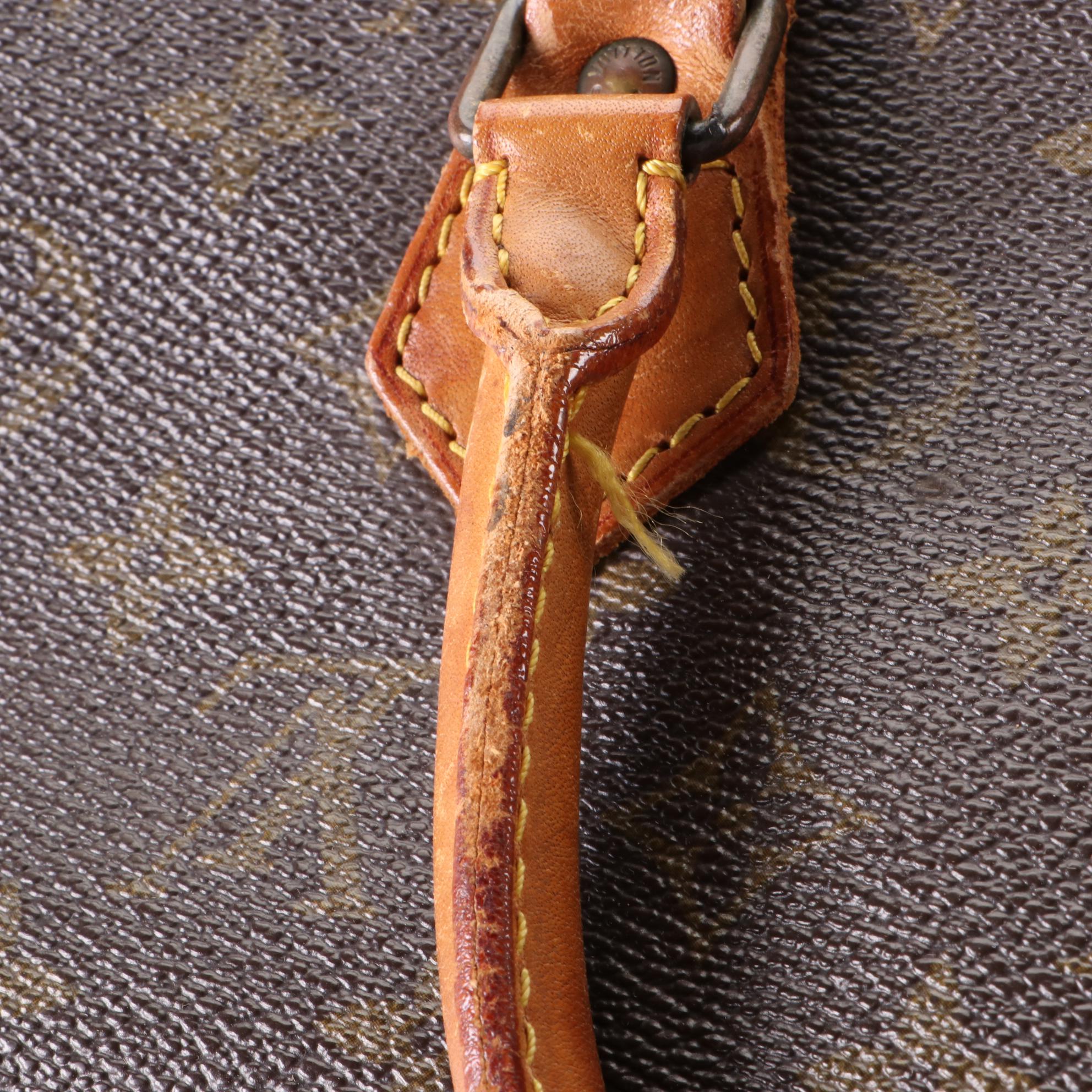 Louis Vuitton Sac Triangle in Monogram Canvas and Vachetta Leather