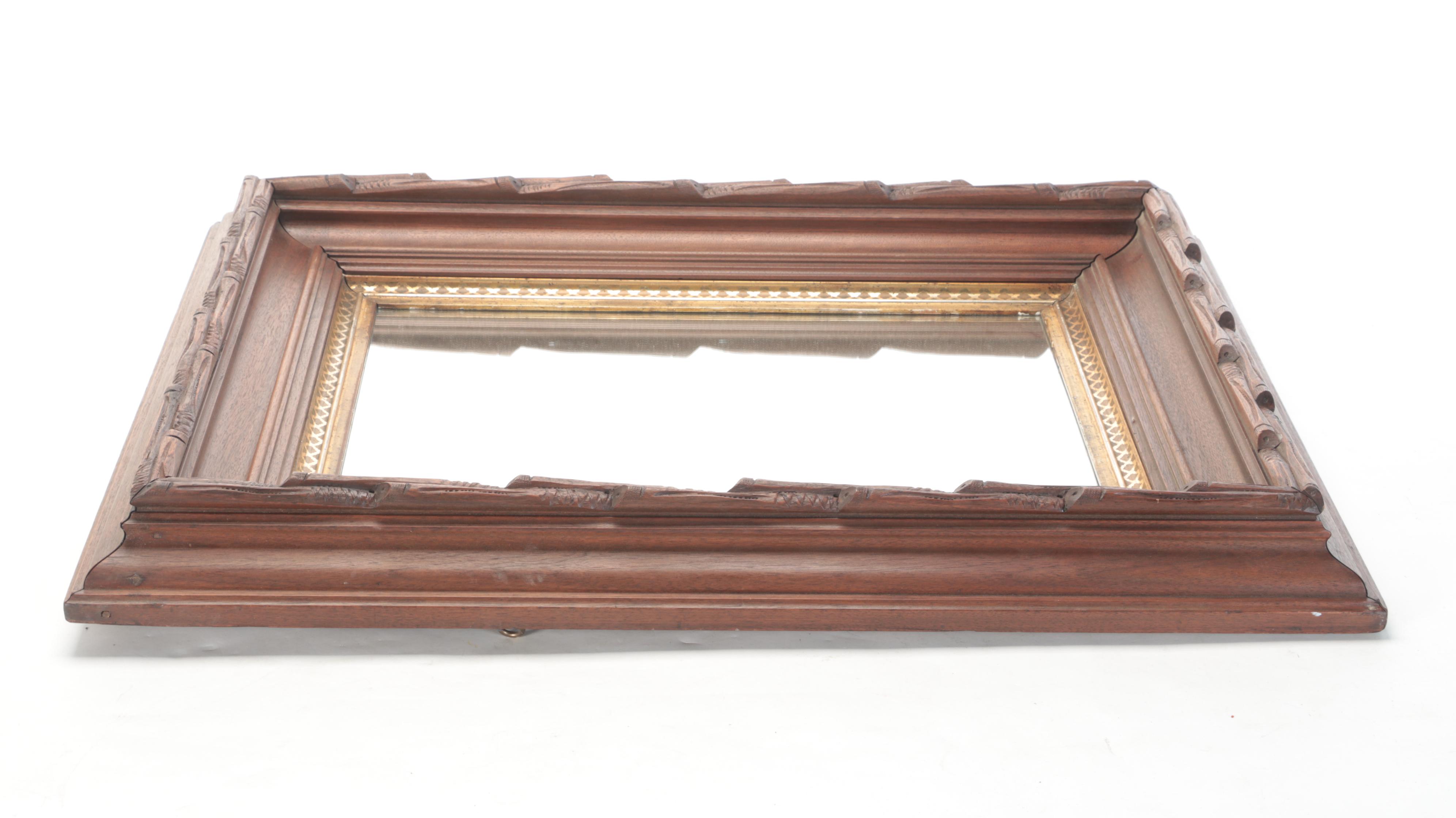 Carved and Gilt Wood Framed Wall Mirror