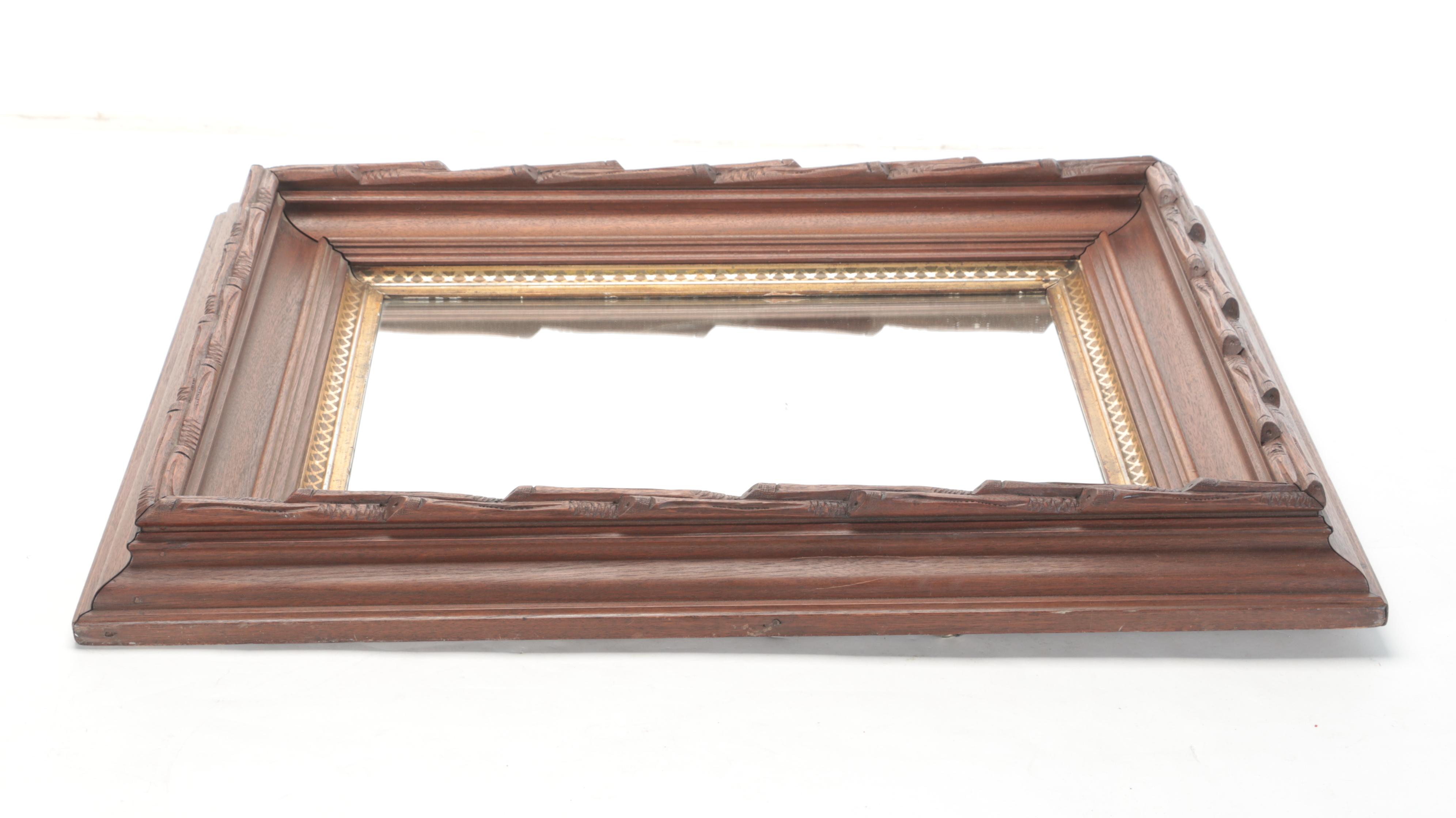 Carved and Gilt Wood Framed Wall Mirror