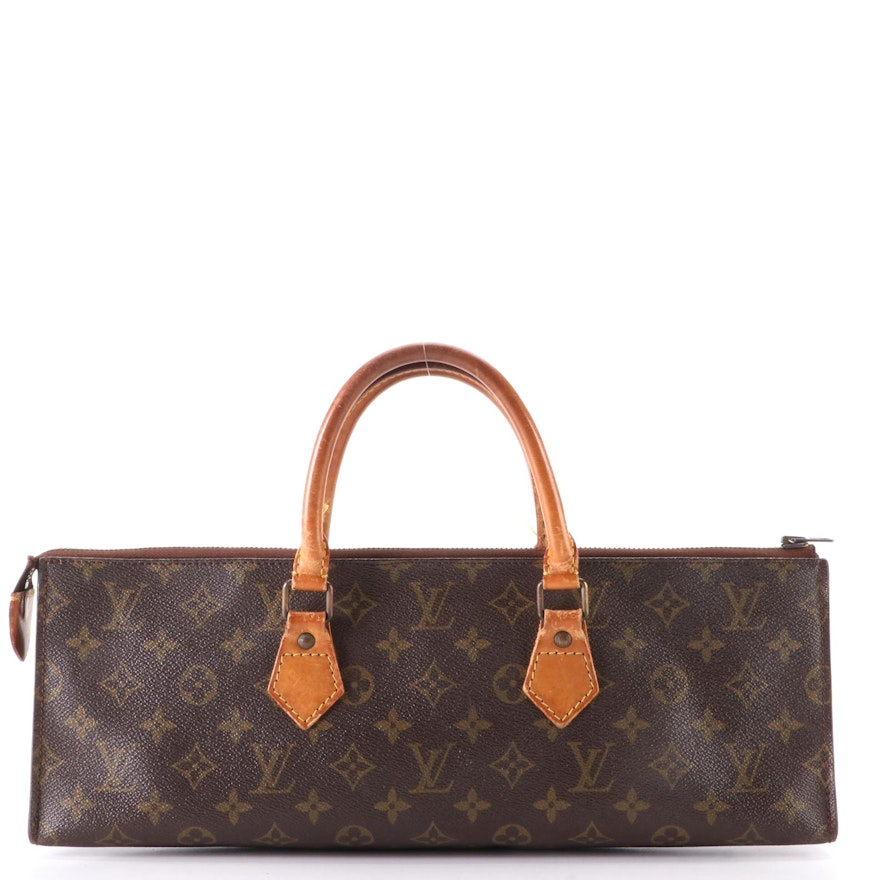Louis Vuitton Sac Triangle in Monogram Canvas and Vachetta Leather