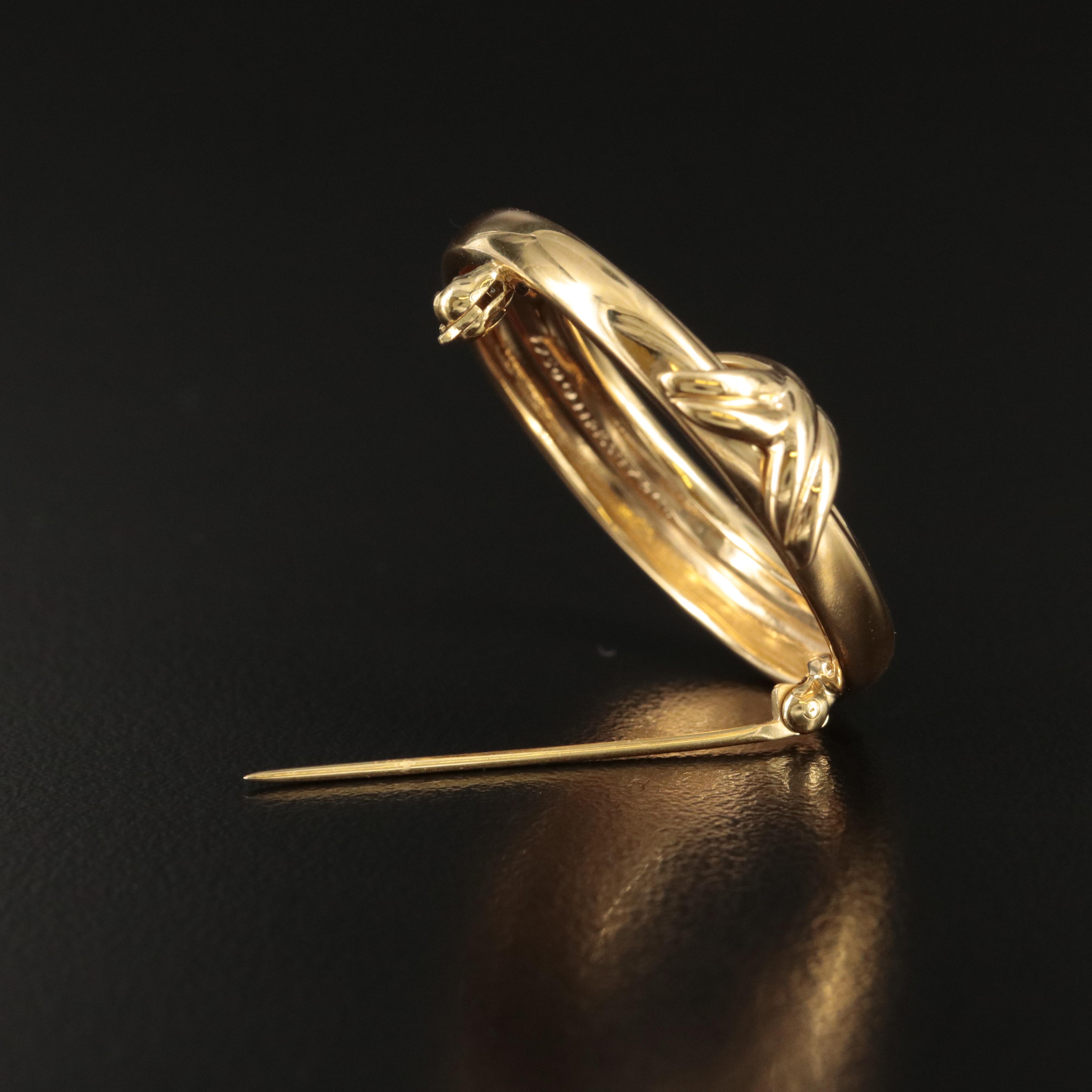 Tiffany & Co. 18K "X and O" Circle Brooch