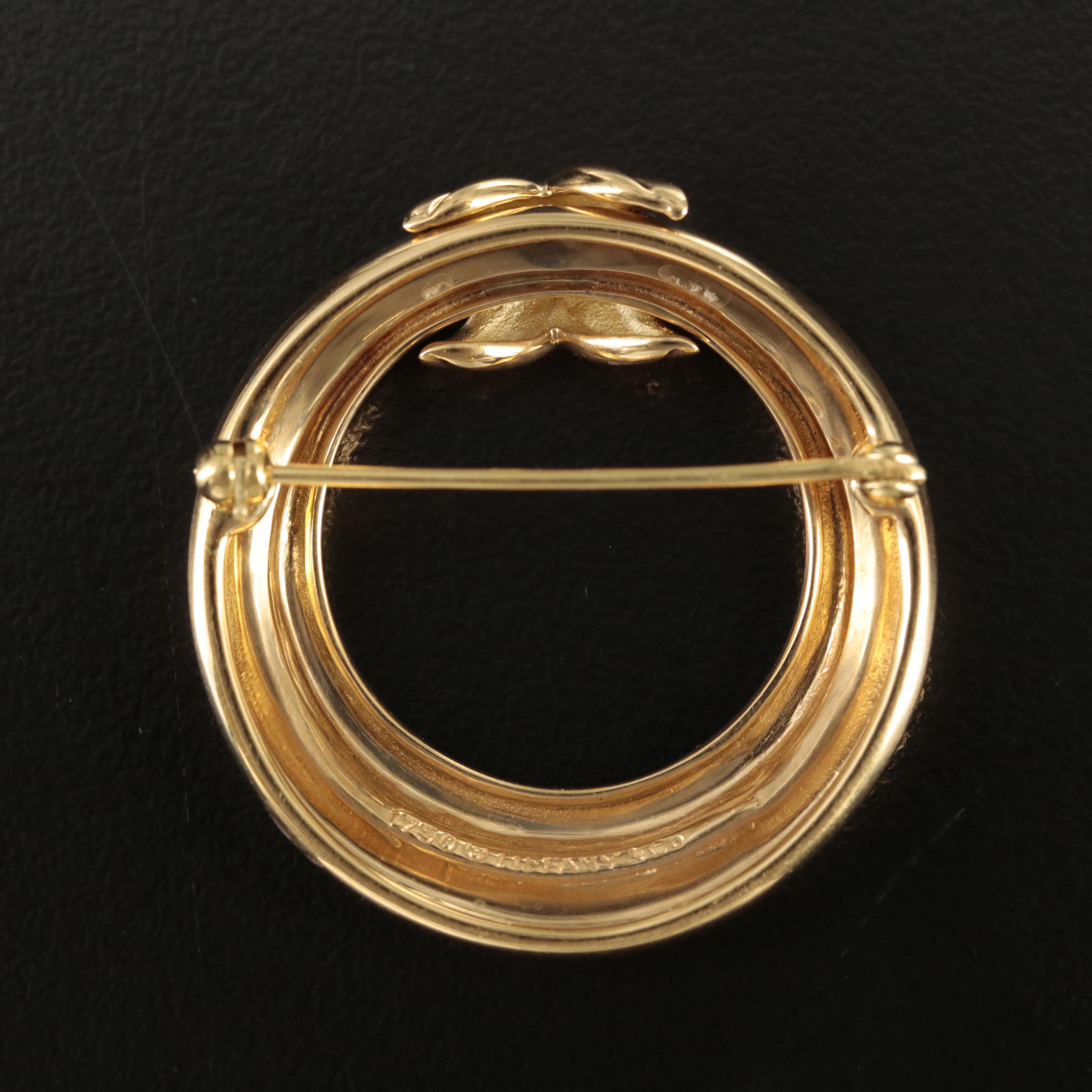 Tiffany & Co. 18K "X and O" Circle Brooch