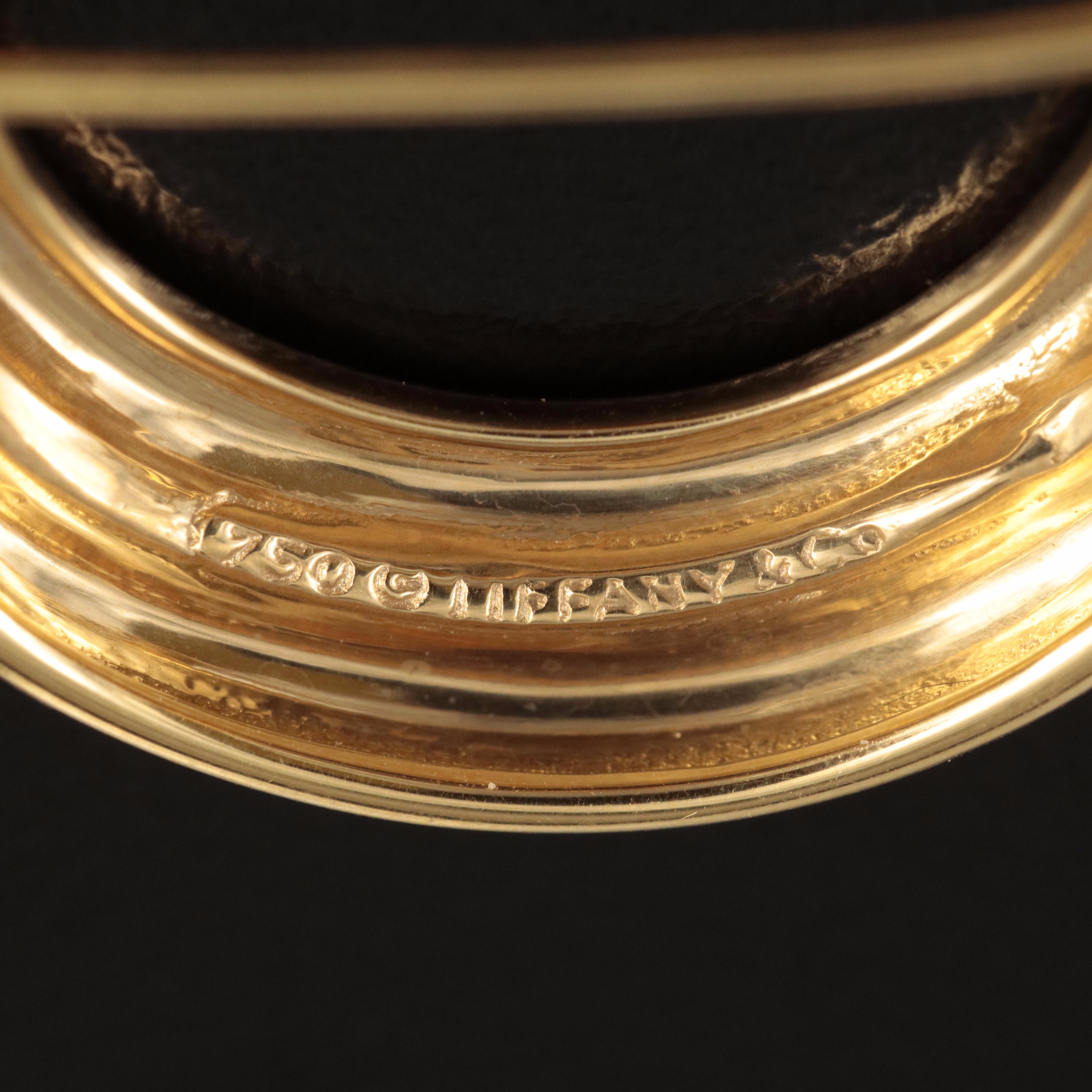 Tiffany & Co. 18K "X and O" Circle Brooch