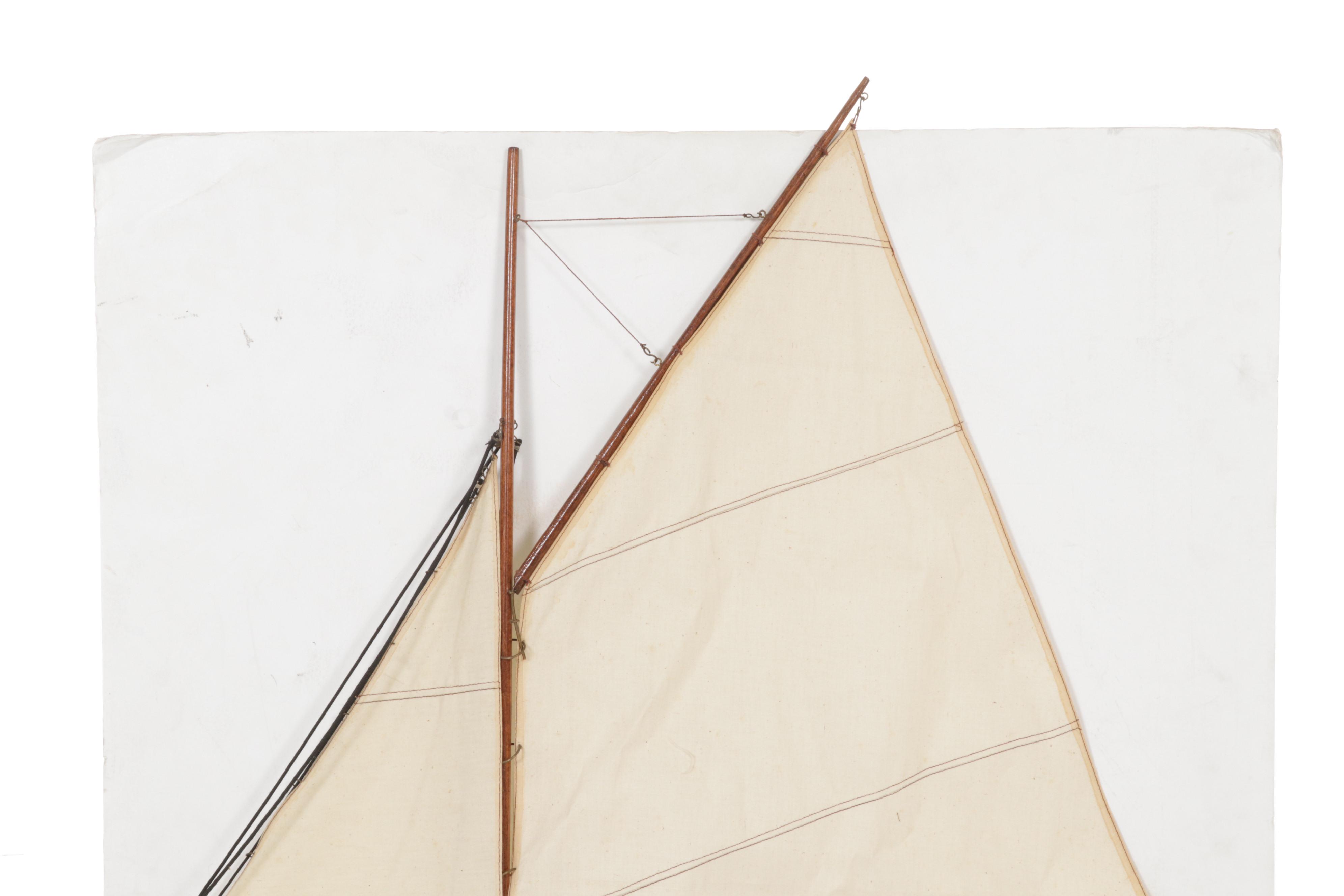 Penn Delmar No. 285 Fishing Reel With Lures and Handcrafted Model Sailboat