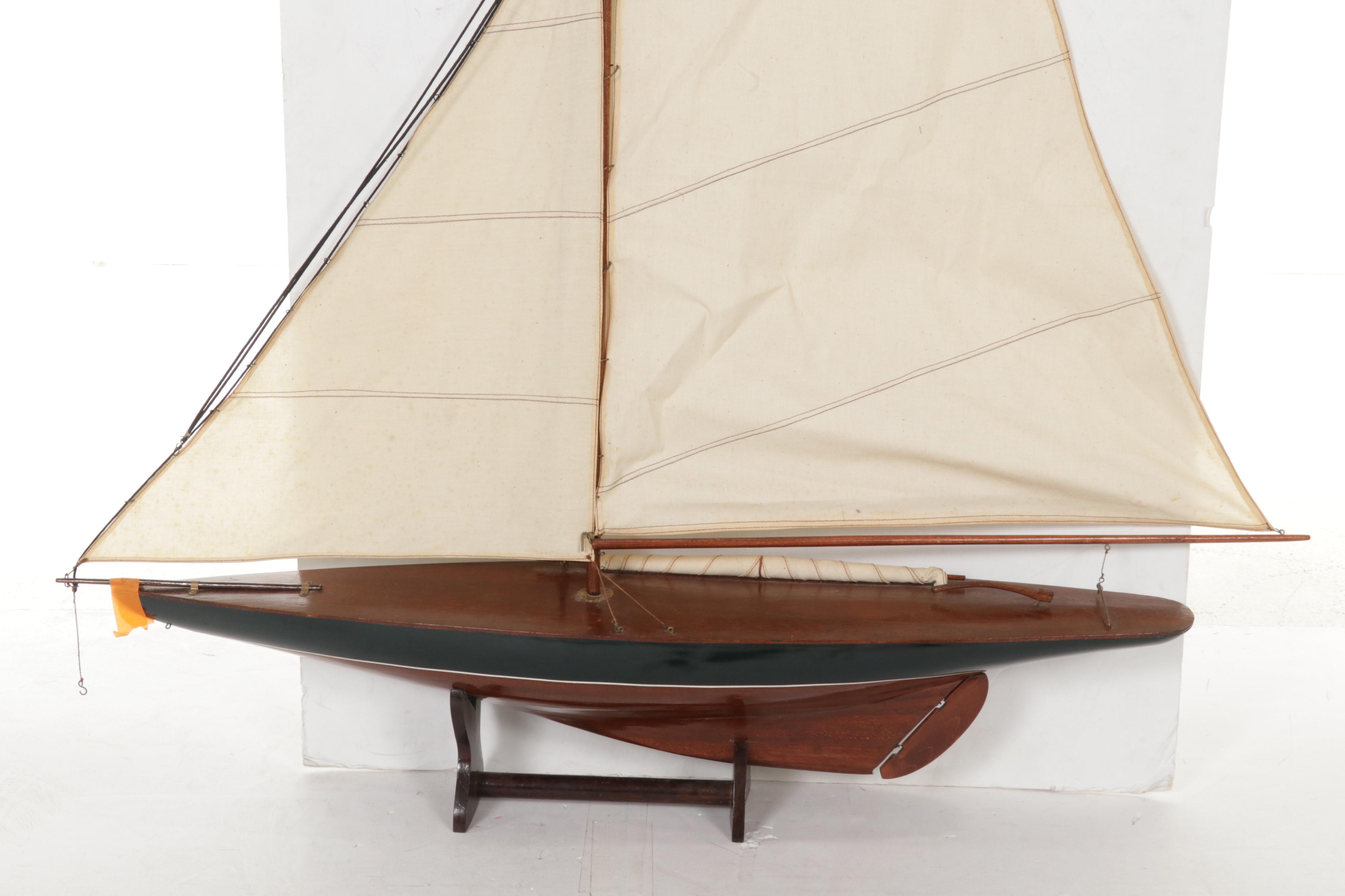 Penn Delmar No. 285 Fishing Reel With Lures and Handcrafted Model Sailboat