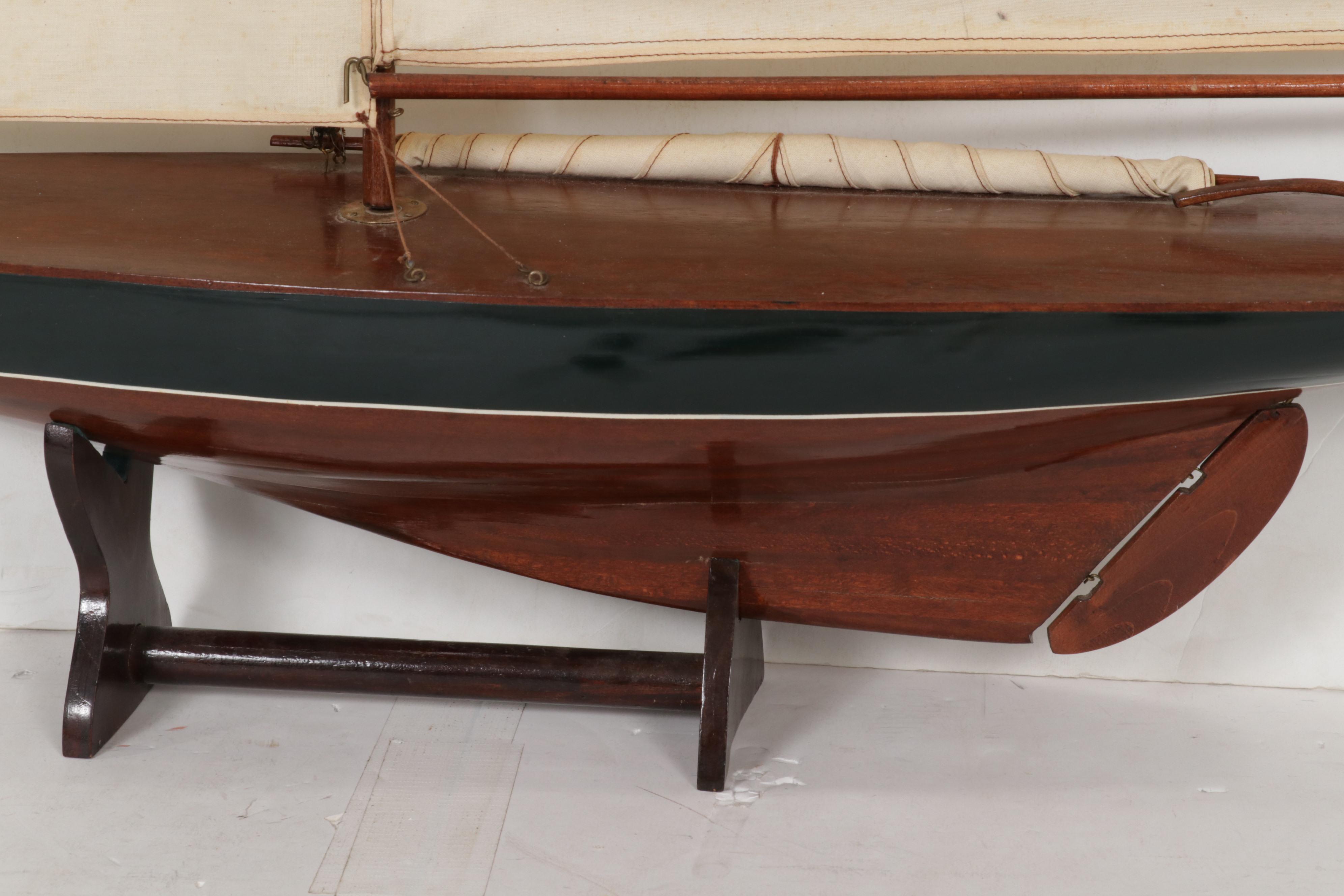 Penn Delmar No. 285 Fishing Reel With Lures and Handcrafted Model Sailboat