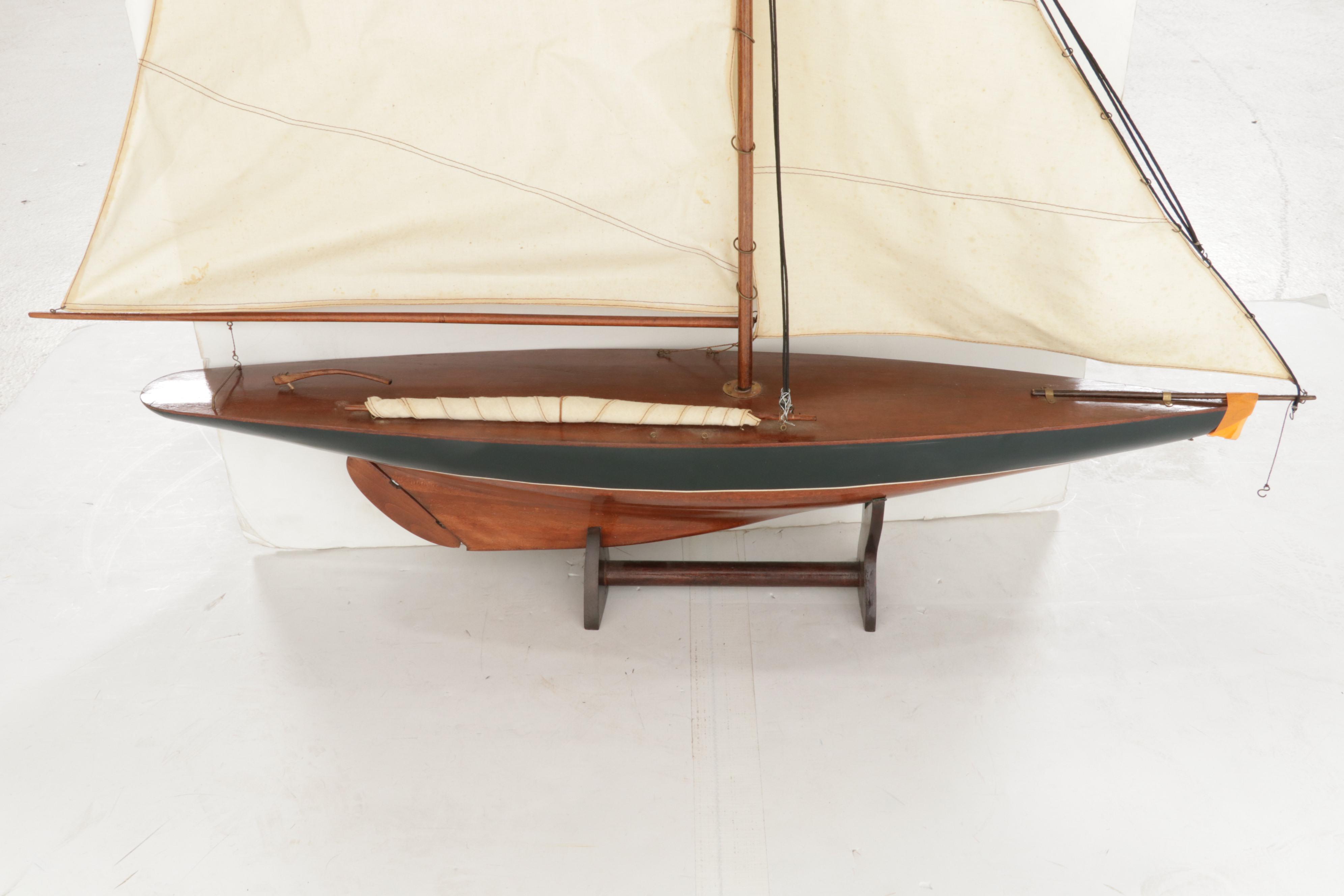 Penn Delmar No. 285 Fishing Reel With Lures and Handcrafted Model Sailboat