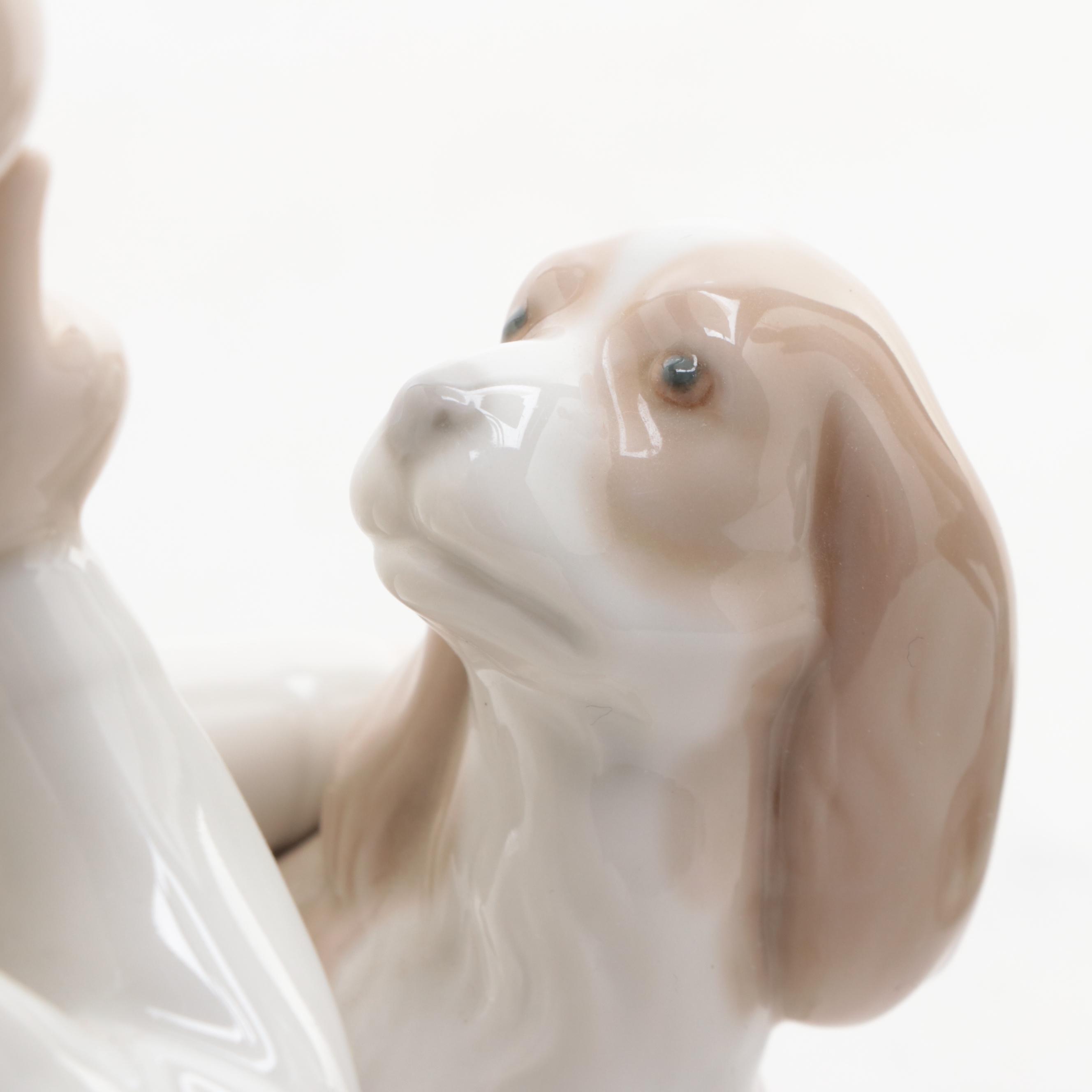 Lladró "Boy with Dog" and "Oration" Porcelain Figurines