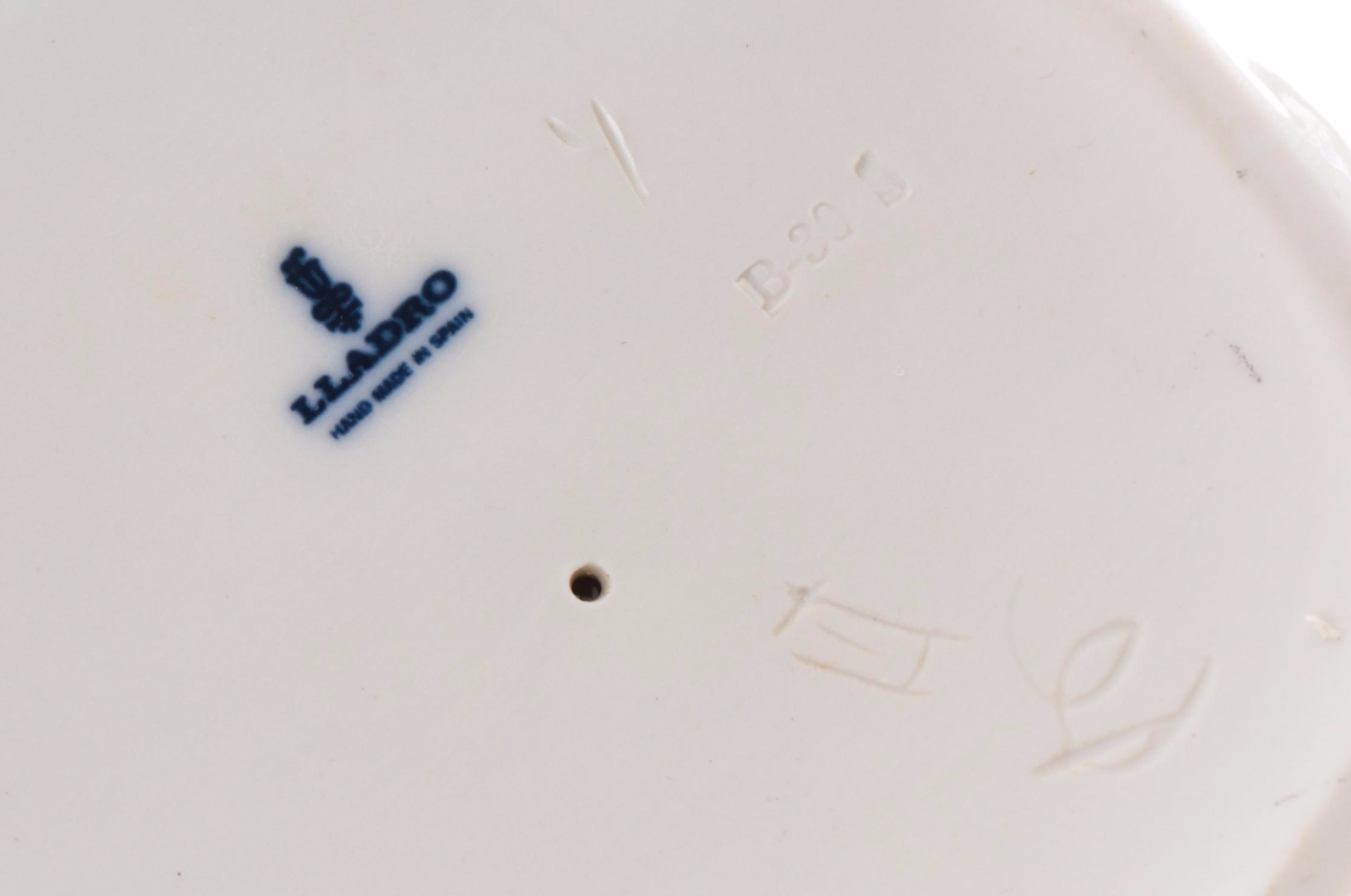 Lladró "Boy with Dog" and "Oration" Porcelain Figurines