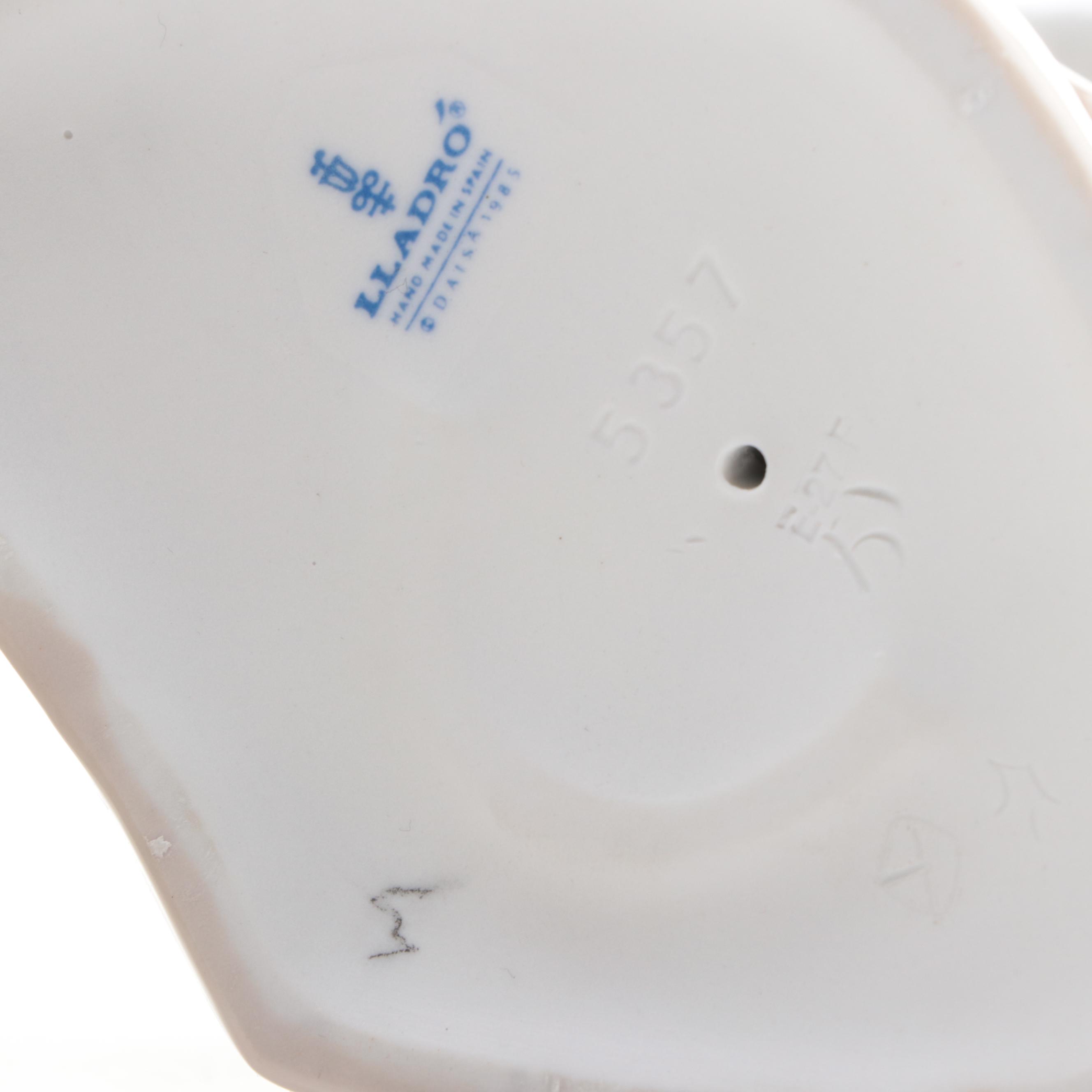 Lladró "Boy with Dog" and "Oration" Porcelain Figurines