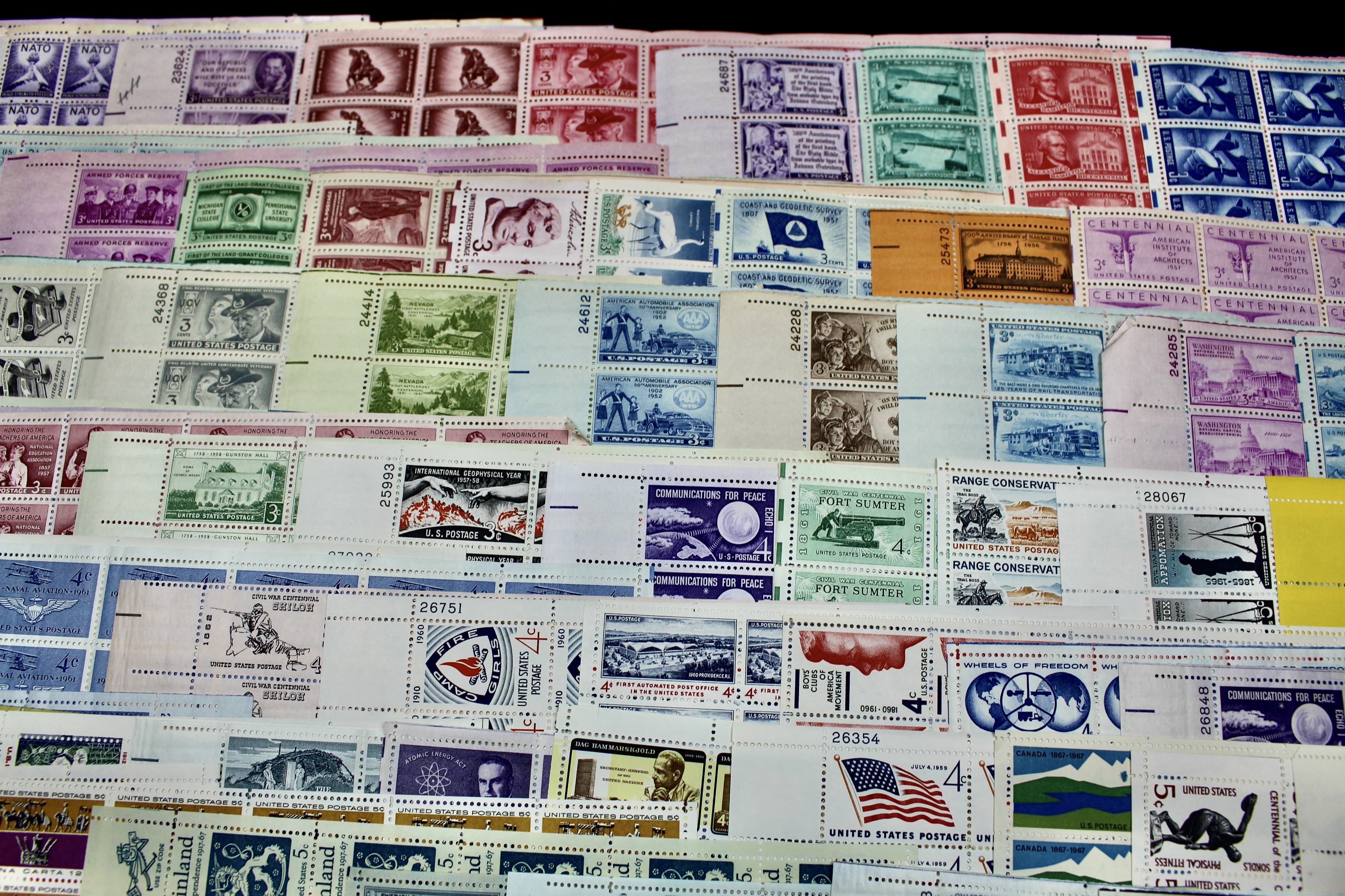 Eighty-Eight U.S. Mint Condition Postage Stamp Sheets, 1940s-1960s