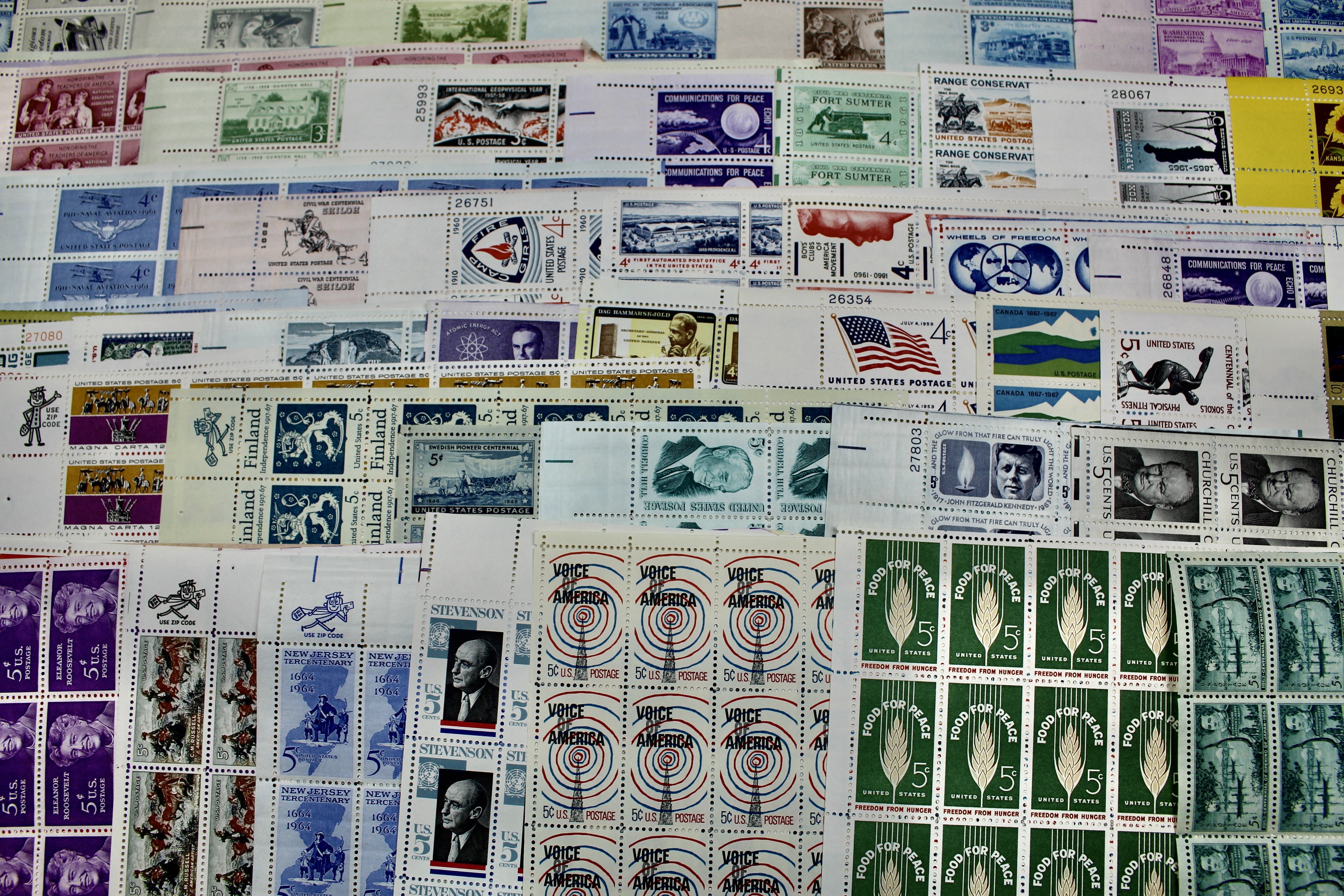 Eighty-Eight U.S. Mint Condition Postage Stamp Sheets, 1940s-1960s