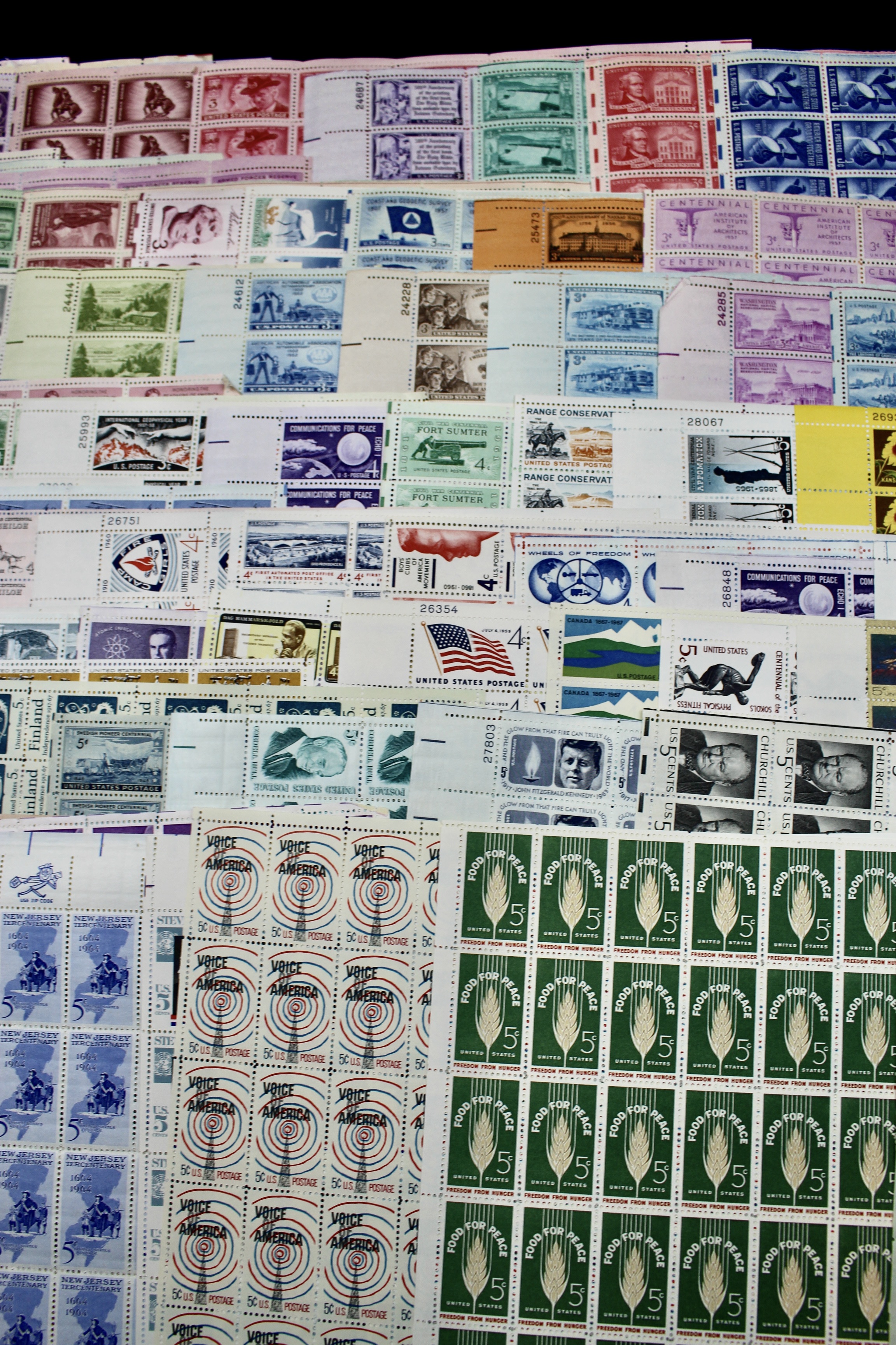 Eighty-Eight U.S. Mint Condition Postage Stamp Sheets, 1940s-1960s