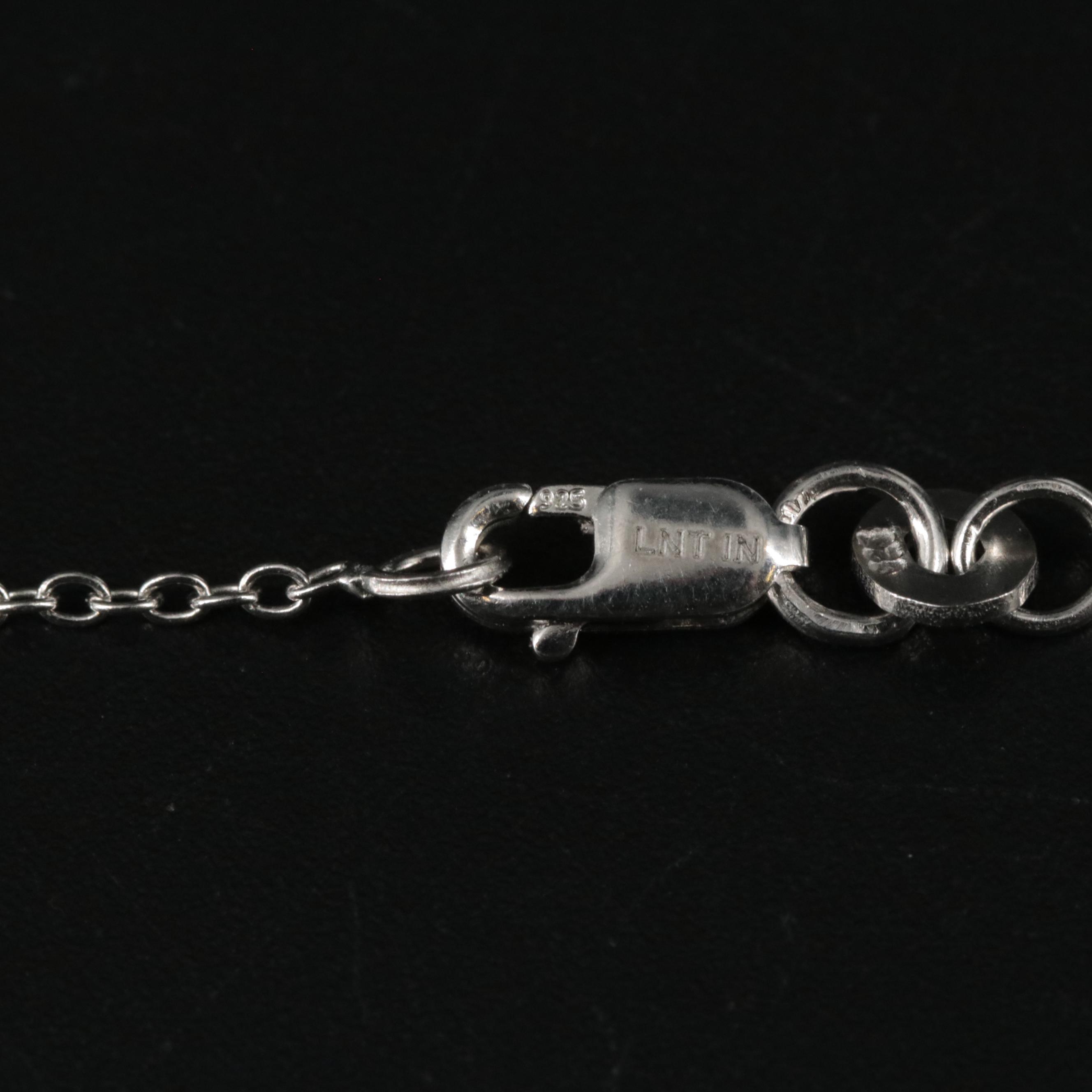 Sterling Emerald and Cubic Zirconia Pendant Necklace