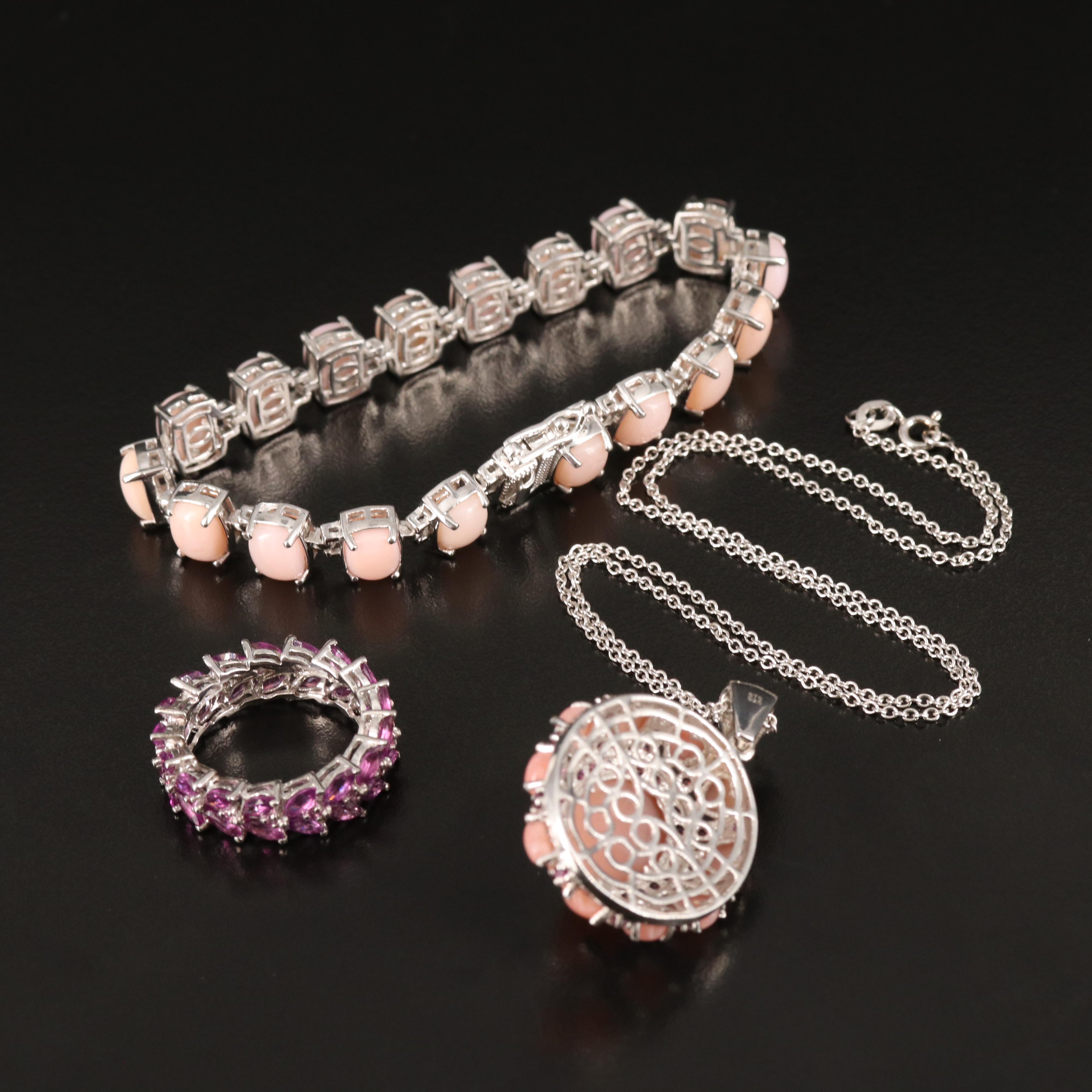 Opal and Garnet Featured in Sterling Jewelry Assortment