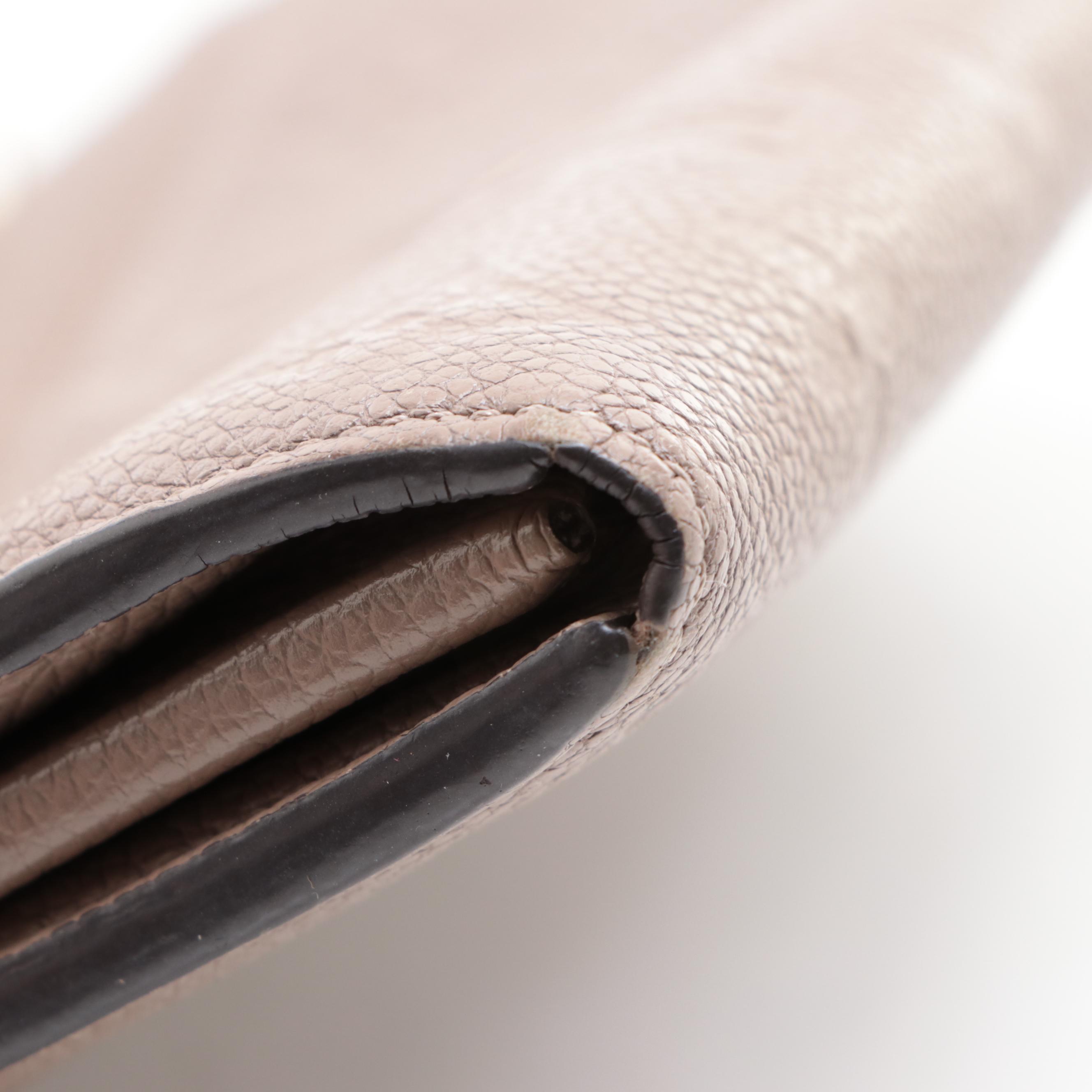 Louis Vuitton Sarah Wallet in Turtledove Empreinte Leather