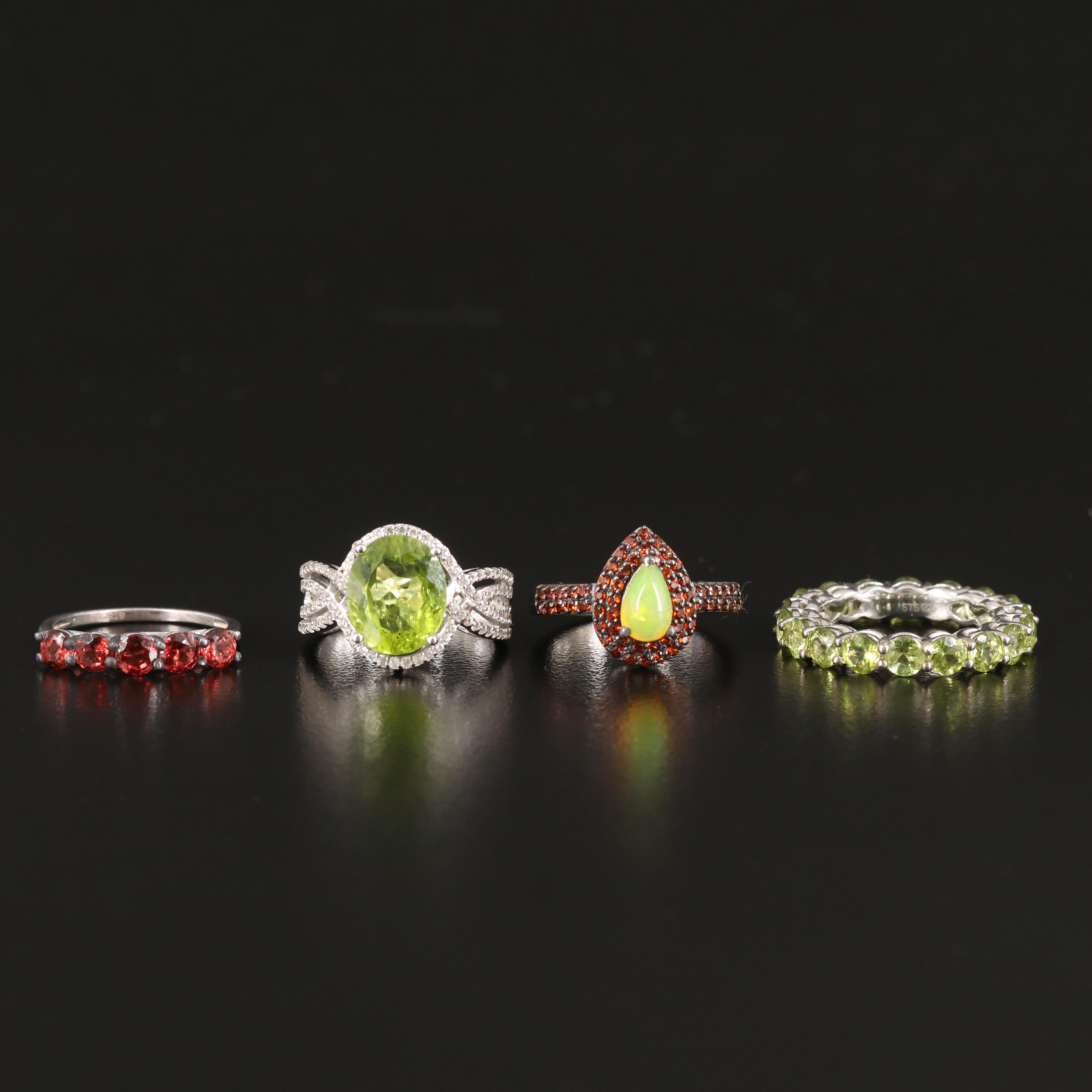 Opal, Peridot and Zircon Featured in Sterling Rings