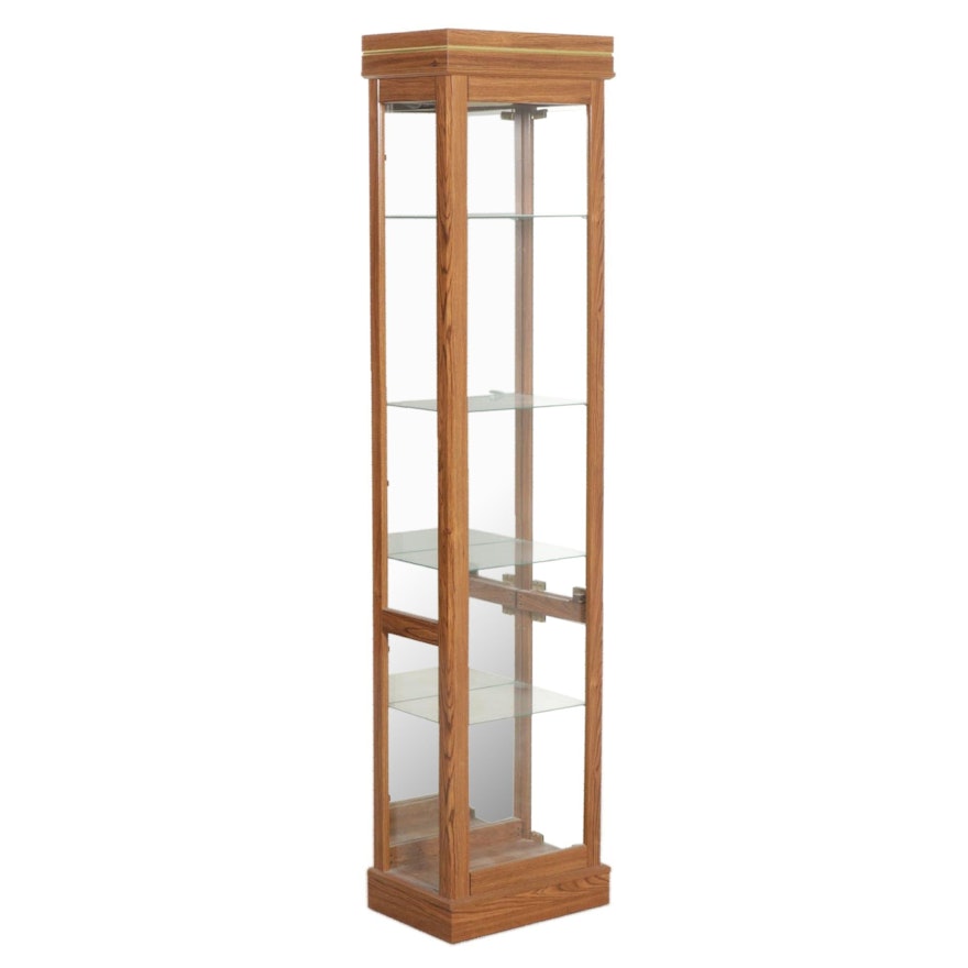 Ashley Furniture Oak-Grained Illuminated Curio Cabinet