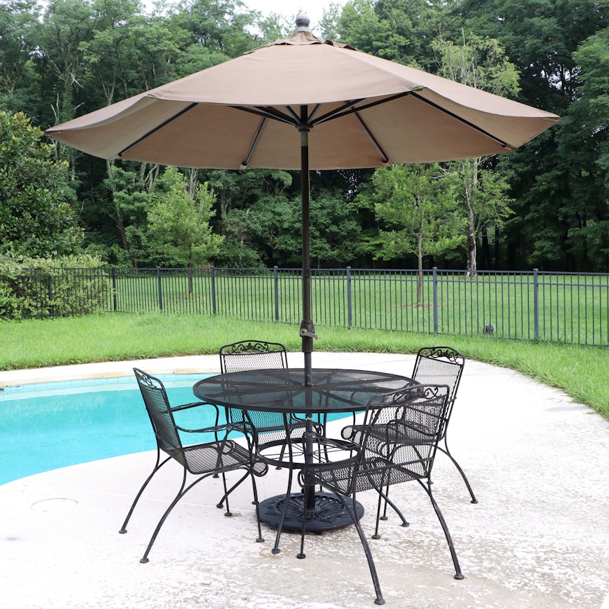 Metal Patio Dining Table with AGIO Tilt Umbrella