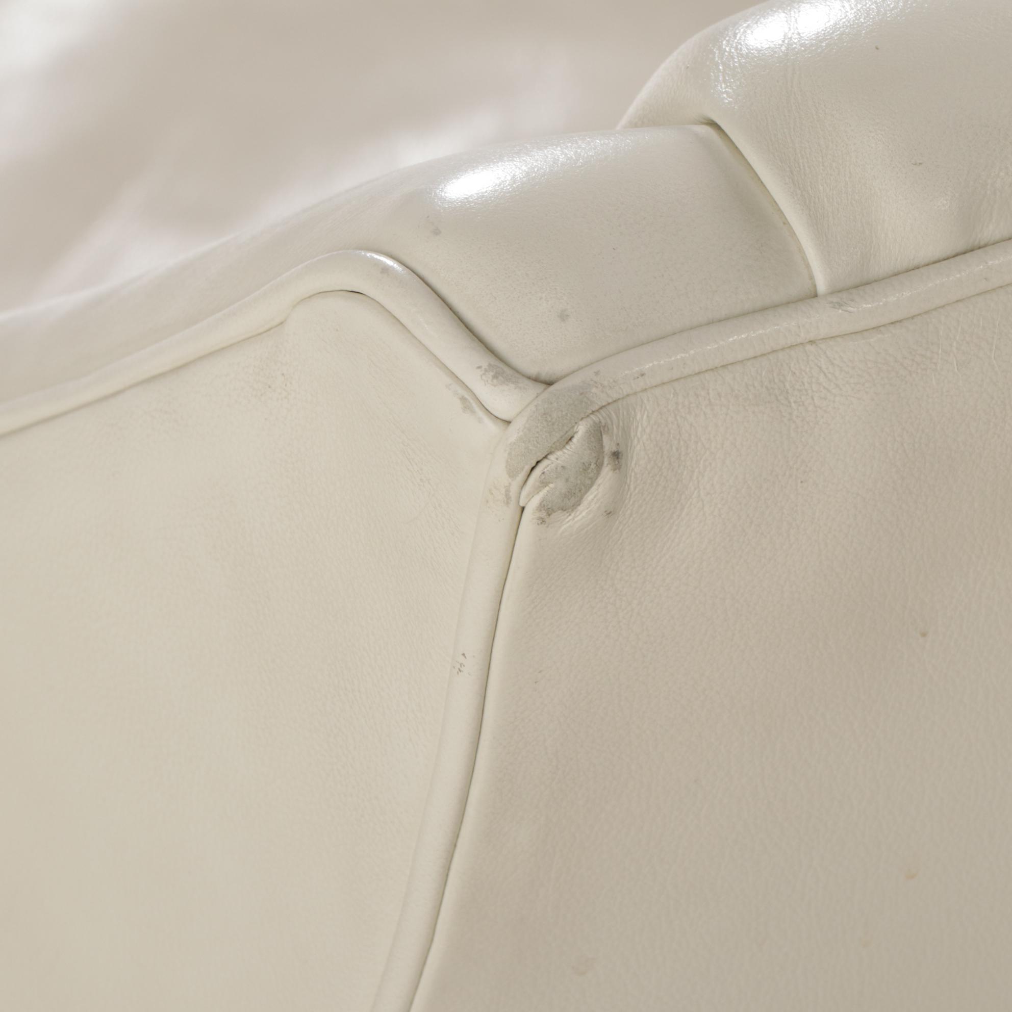 Pair of Royal Custom Designs Ivory Faux Leather Lounge Chairs