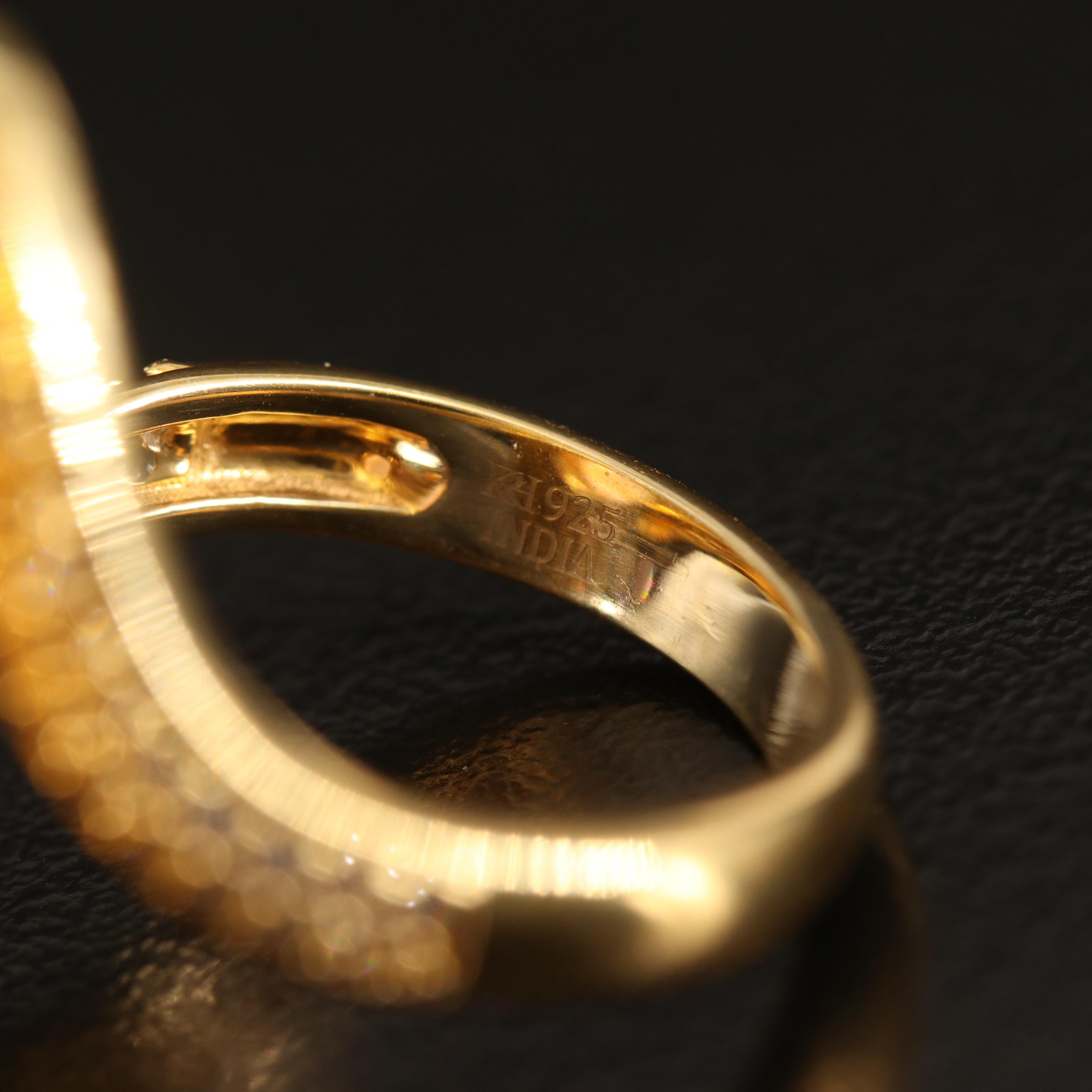 Rose Quartz Ring Surrounded by Amethyst and White Zircon in Sterling