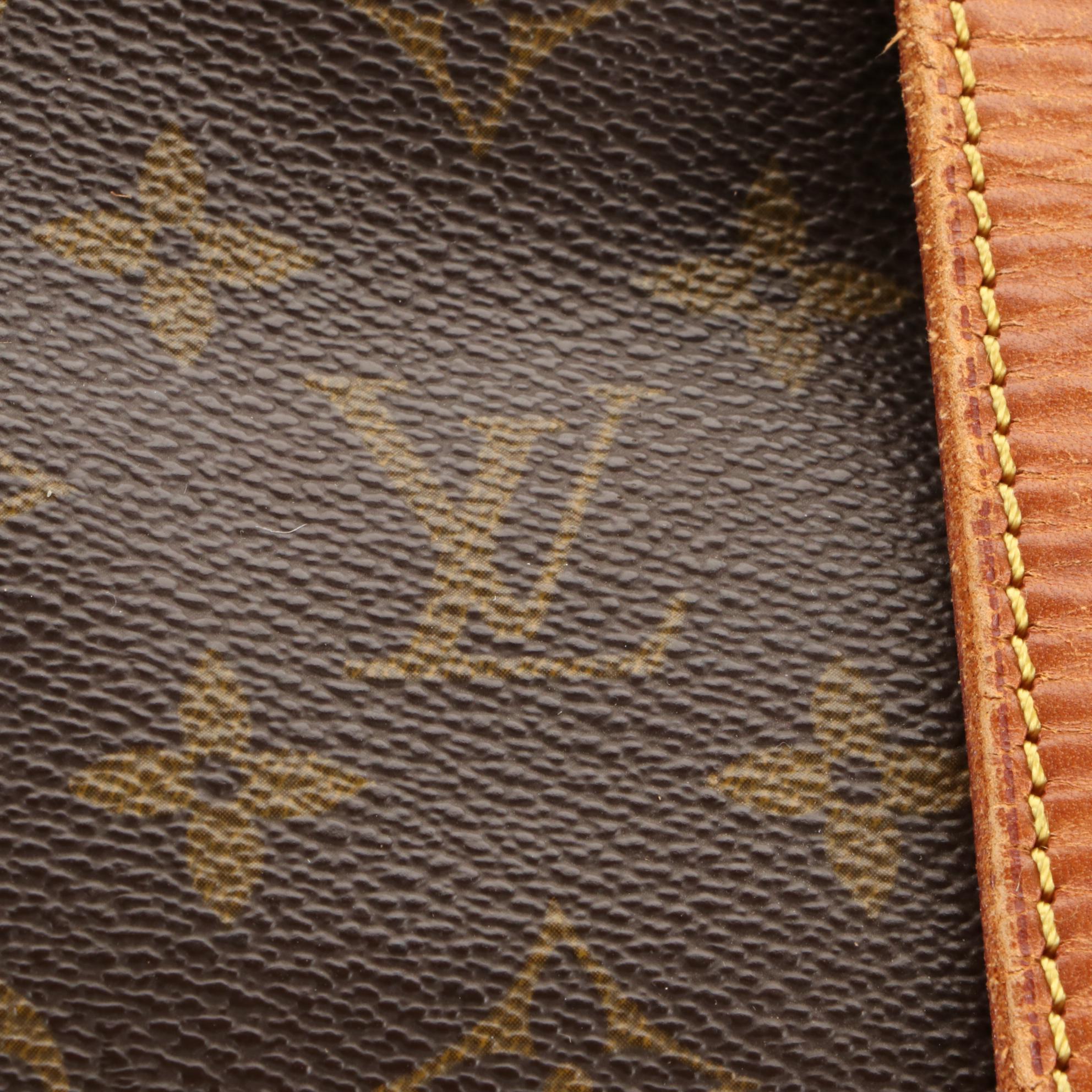 Louis Vuitton Saumur 35 Messenger Bag in Monogram Canvas and Vachetta Leather