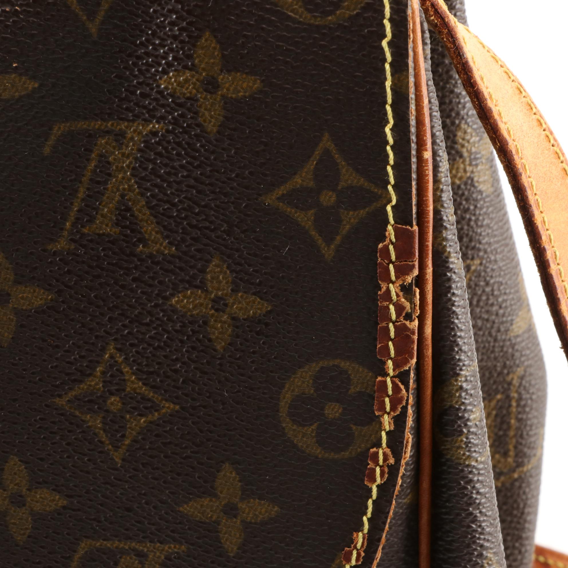 Louis Vuitton Saumur 35 Messenger Bag in Monogram Canvas and Vachetta Leather