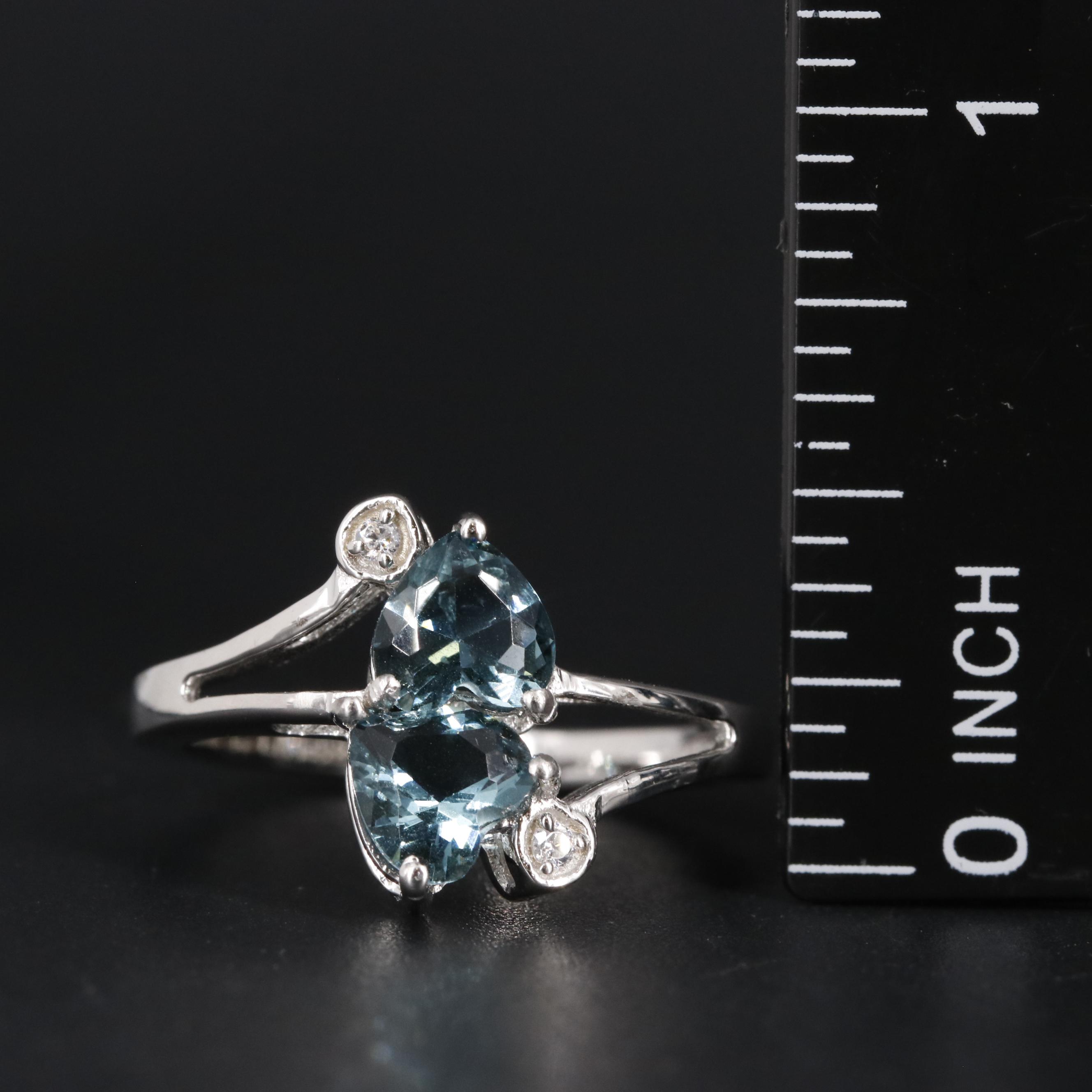 Sterling Light Blue Topaz and Cubic Zirconia Ring