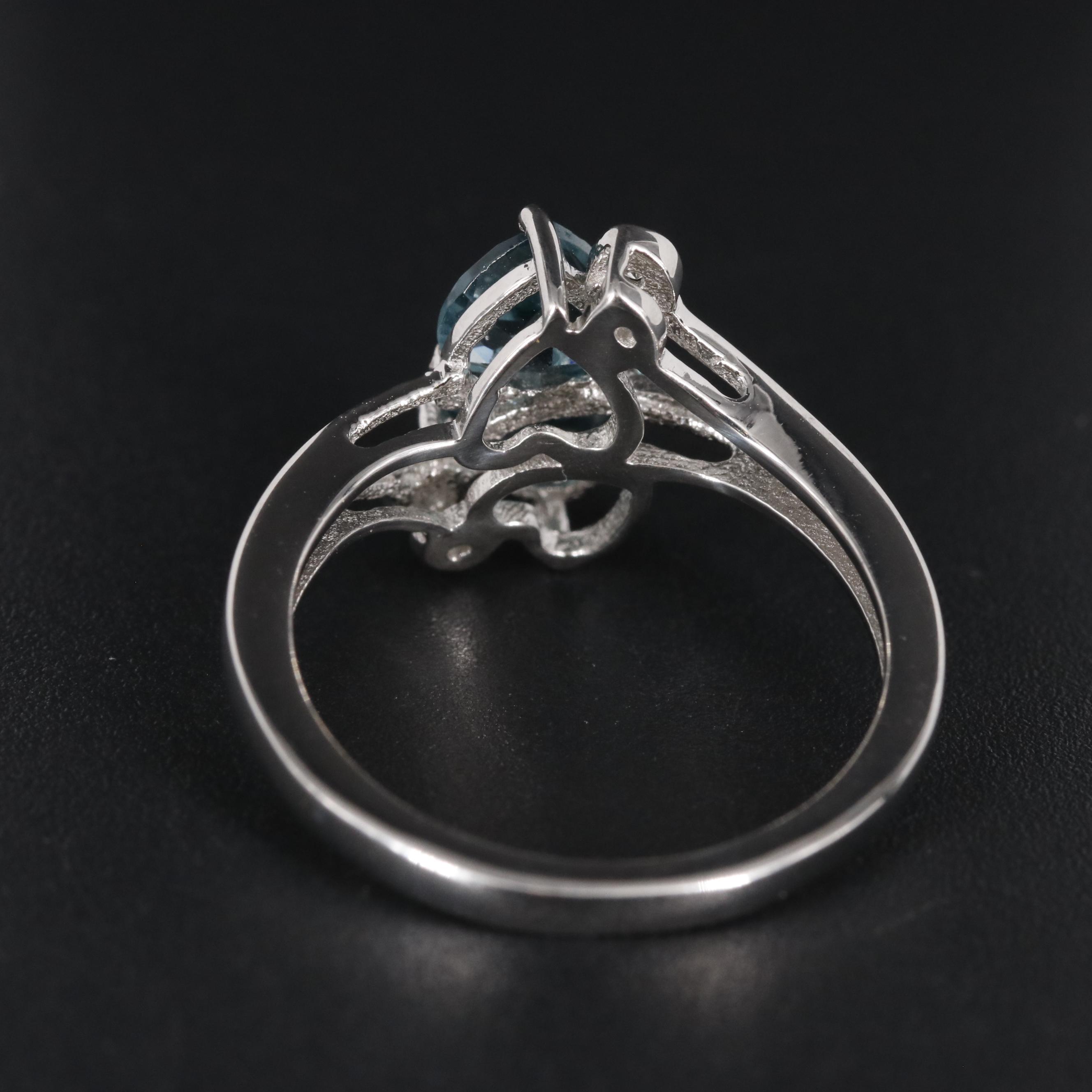 Sterling Light Blue Topaz and Cubic Zirconia Ring