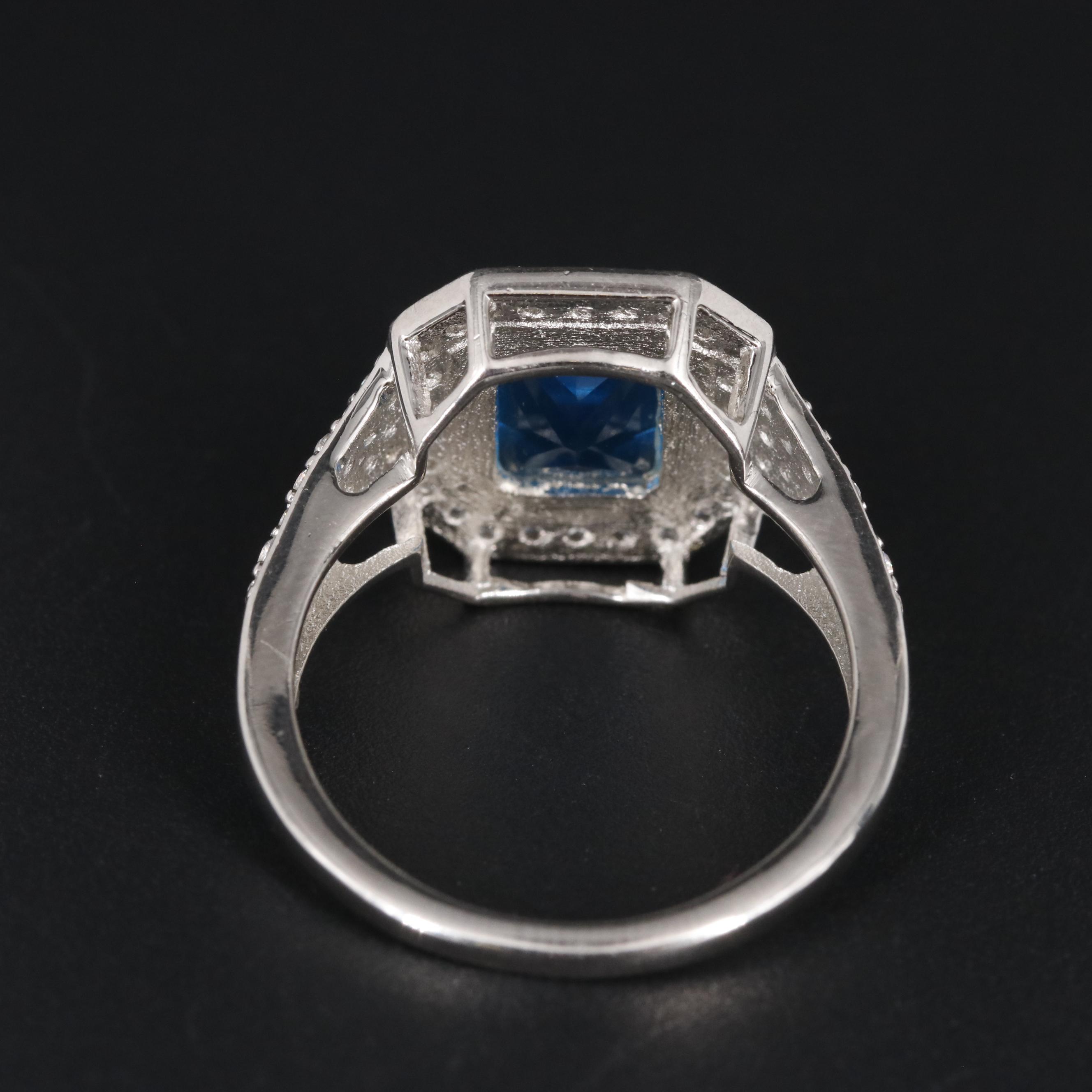 Sterling Blue Topaz with Cubic Zirconia Ring