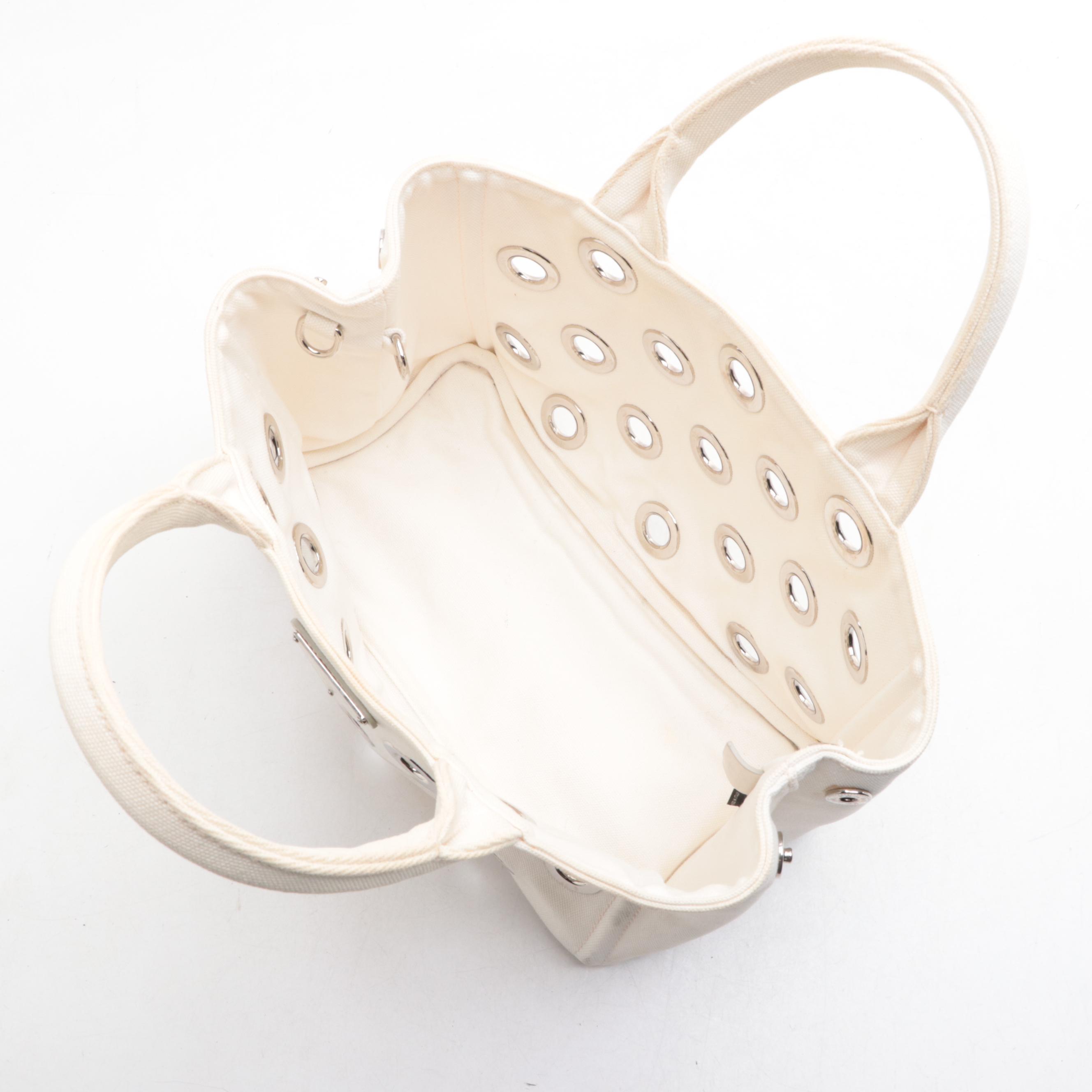 Prada Grommet Embellished Canvas Tote