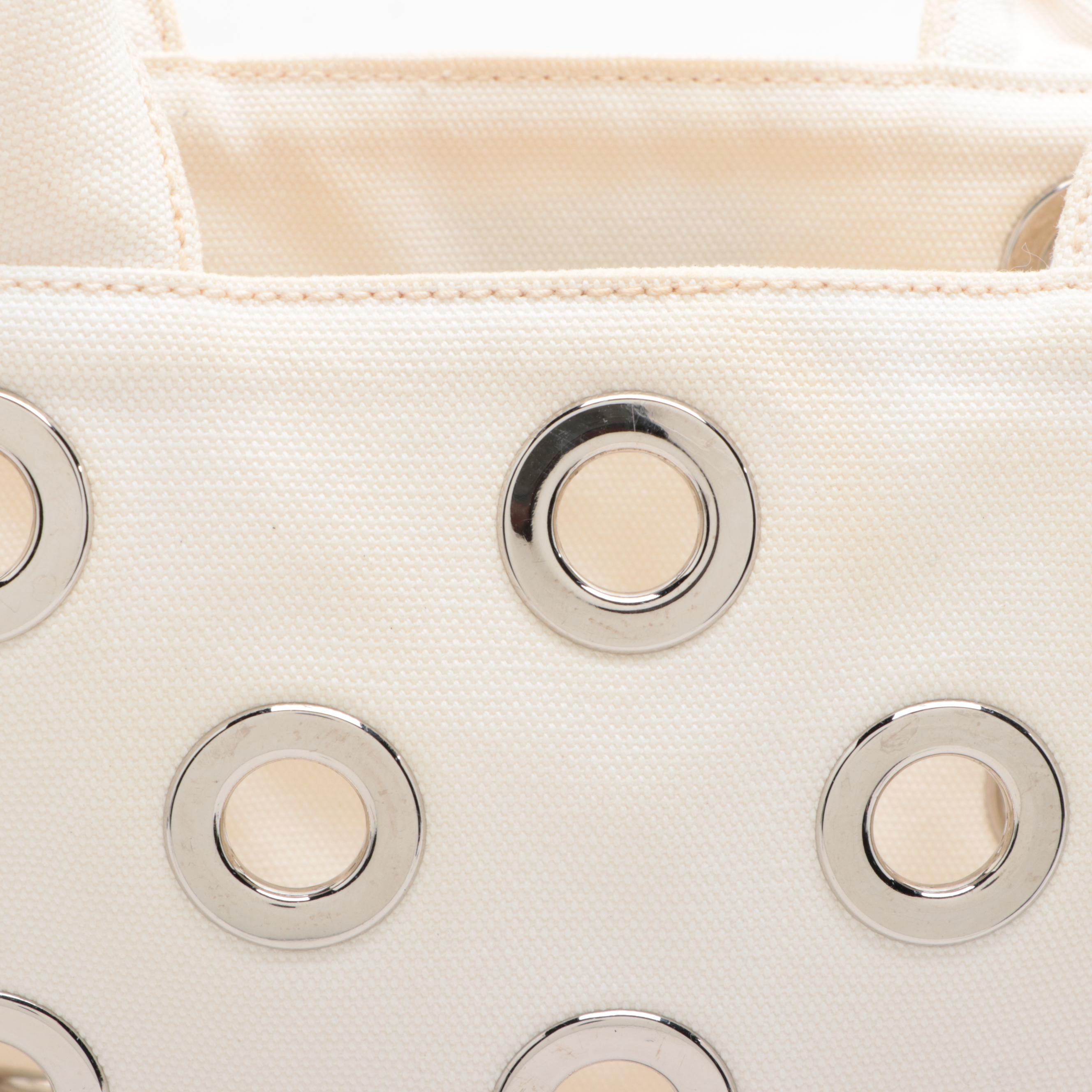 Prada Grommet Embellished Canvas Tote