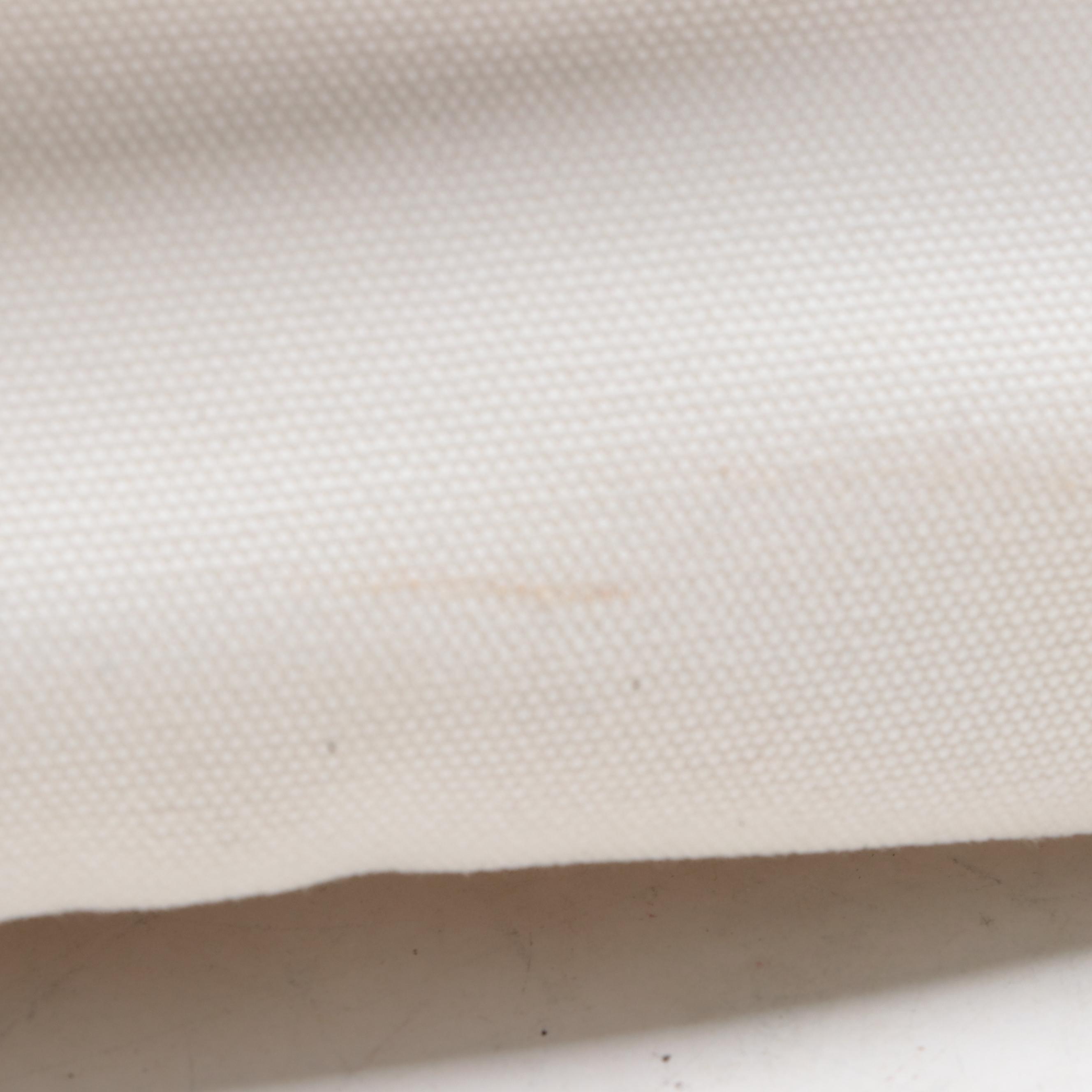 Prada Grommet Embellished Canvas Tote