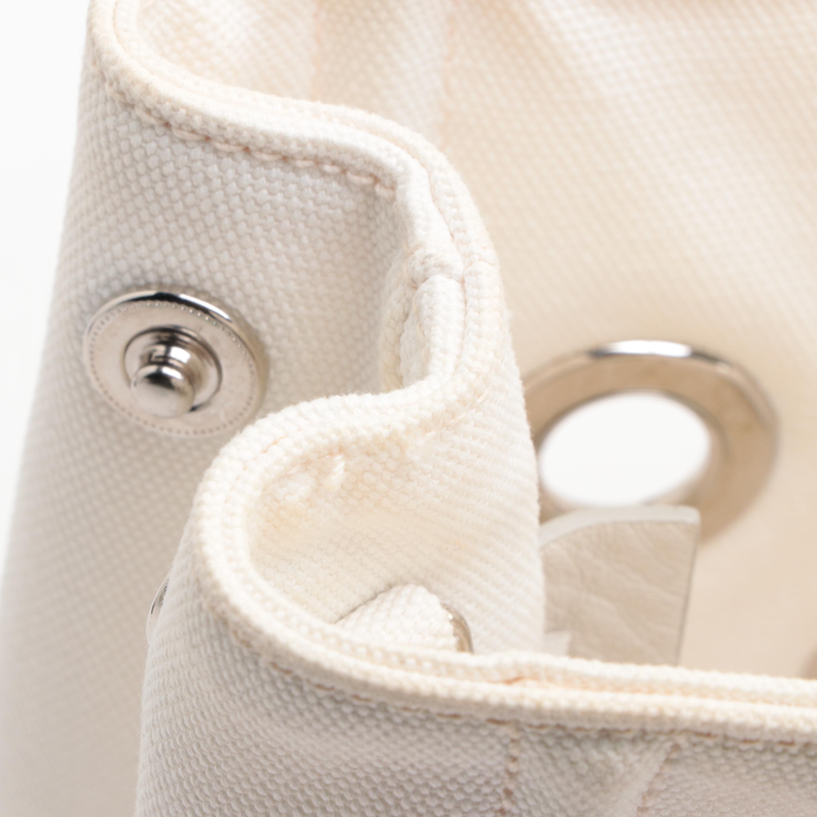 Prada Grommet Embellished Canvas Tote