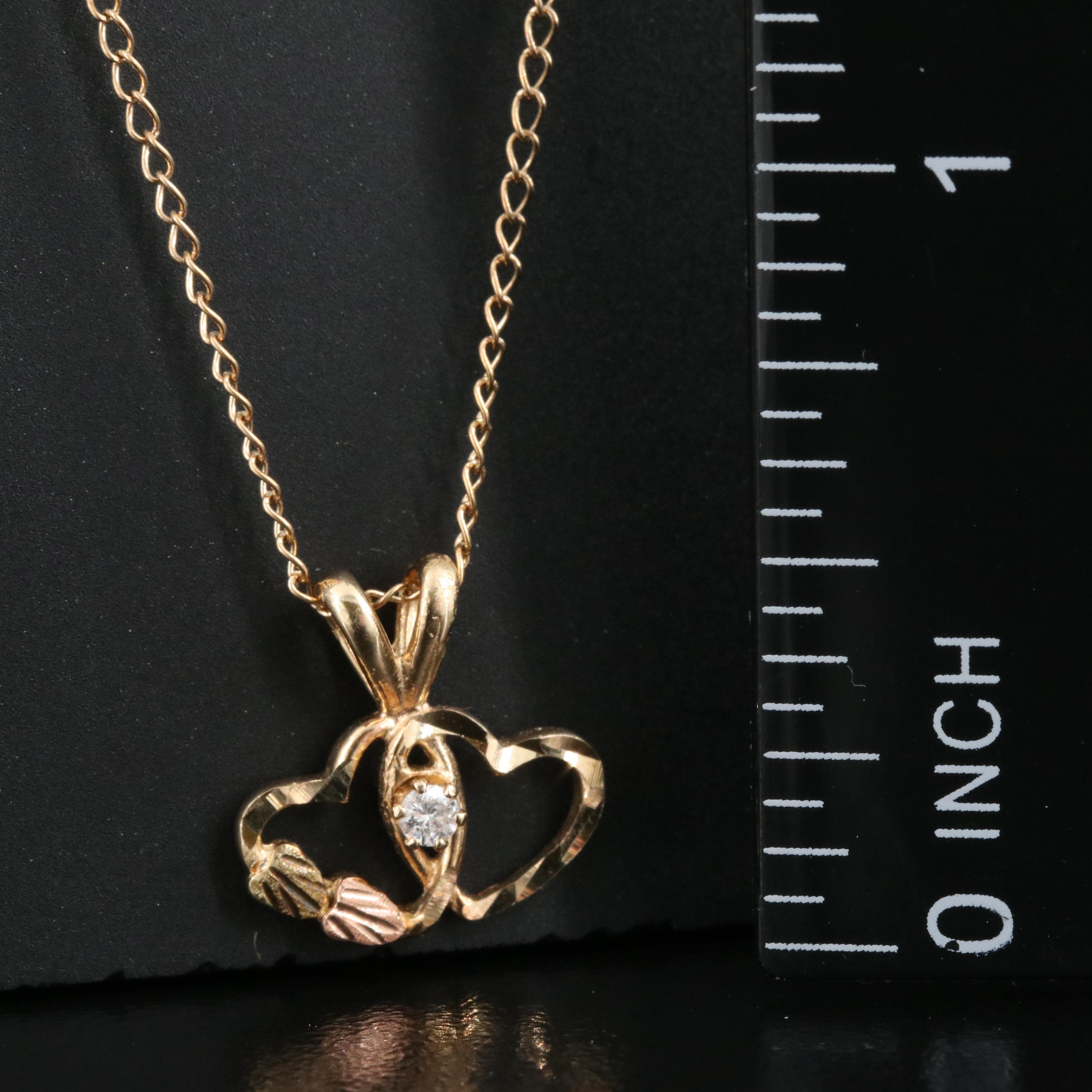 10K 0.03 CT Diamond Double Heart Pendant Necklace