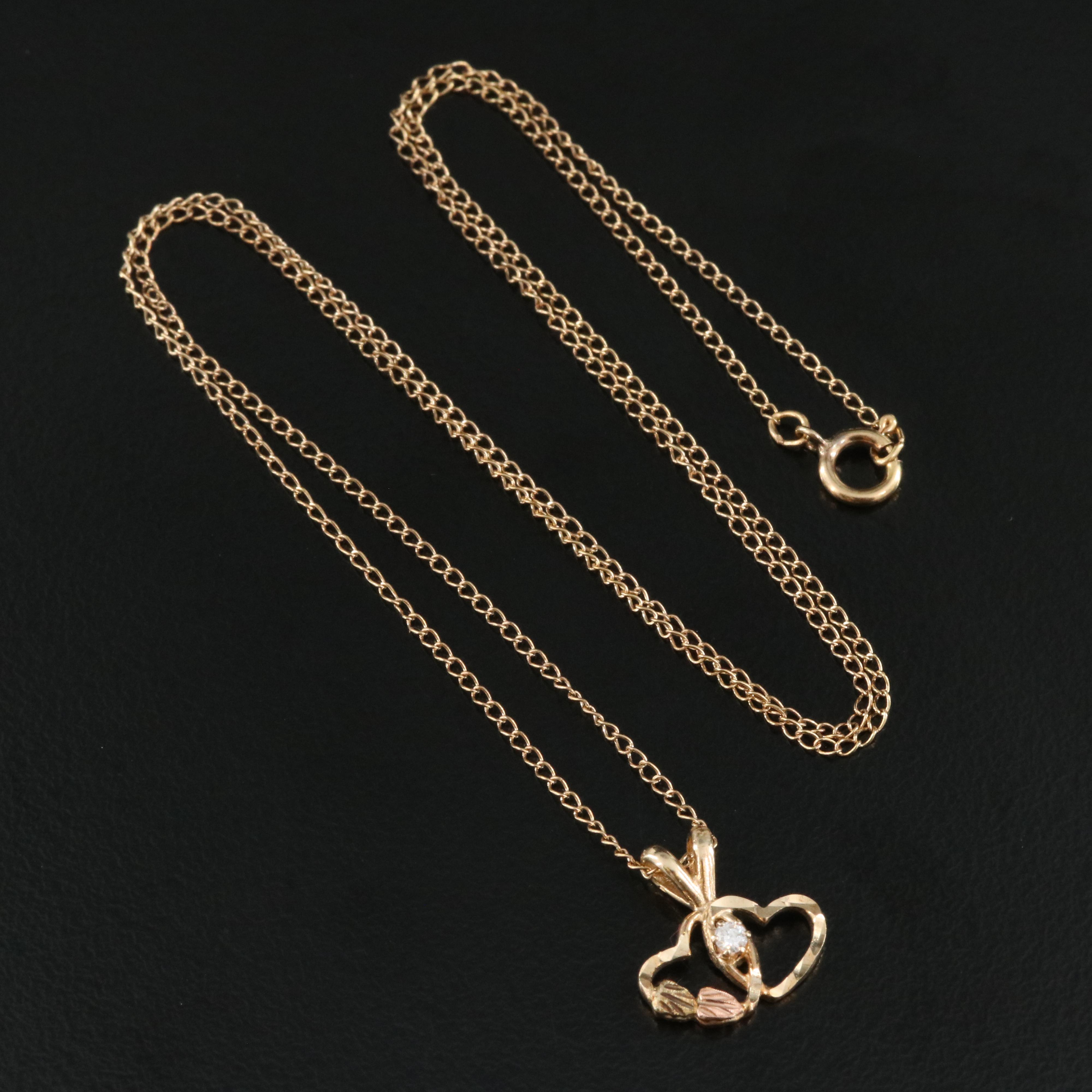 10K 0.03 CT Diamond Double Heart Pendant Necklace